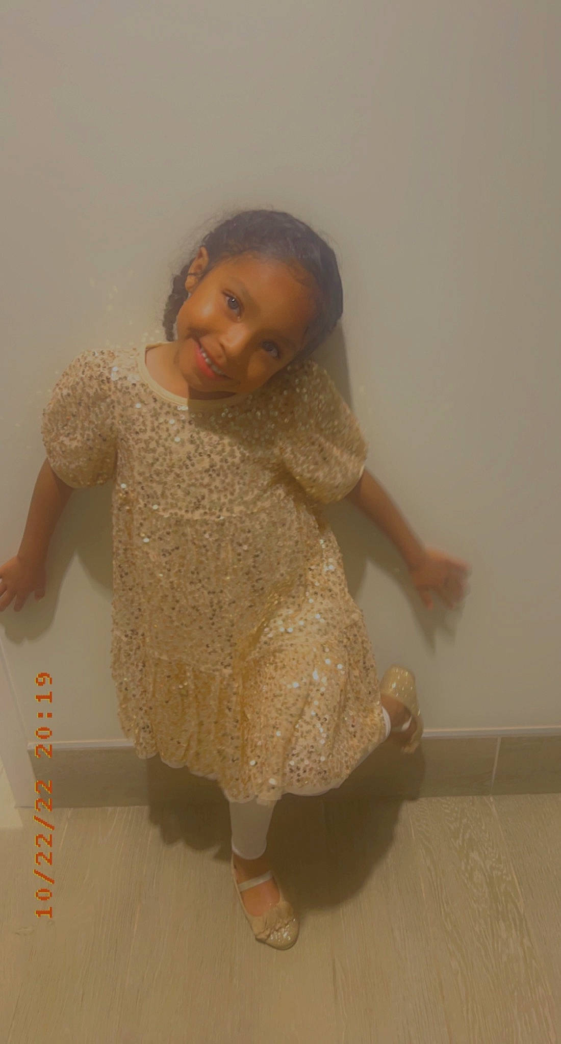 Zayla is registered to the contest to win money with this photo: baby_toddler_clothing, cheek, child, floor, flooring, fun, gesture, hair, happy, head, joint, joy, neck, person, sandal, skin, sleeve, smile, thumb, toddler