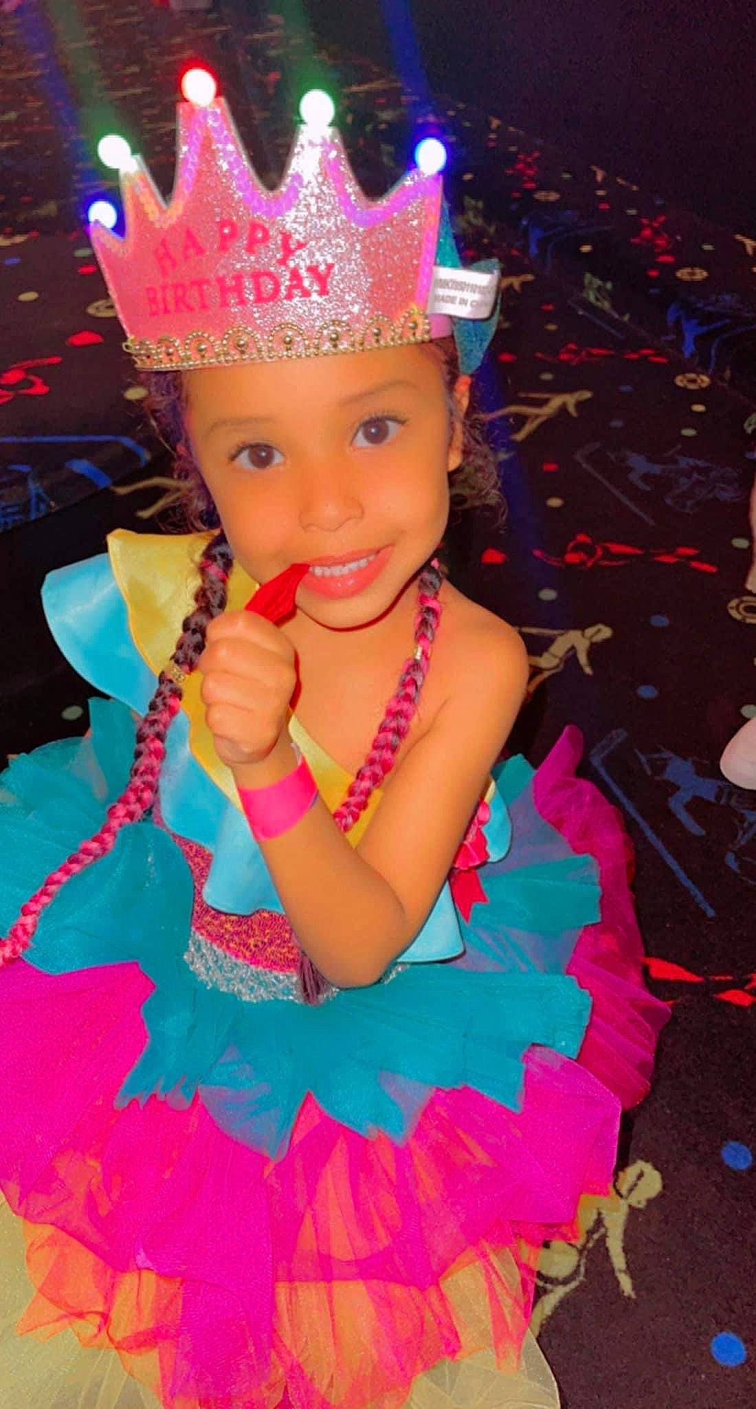 Zayla joined the competition — help win amazing prizes! costume_hat, electric_blue, entertainment, event, fashion, fashion_accessory, fun, hair_accessory, happy, headgear, headpiece, headwear, jewellery, joy, magenta, necklace, party_supply, performing_arts, person, pink
