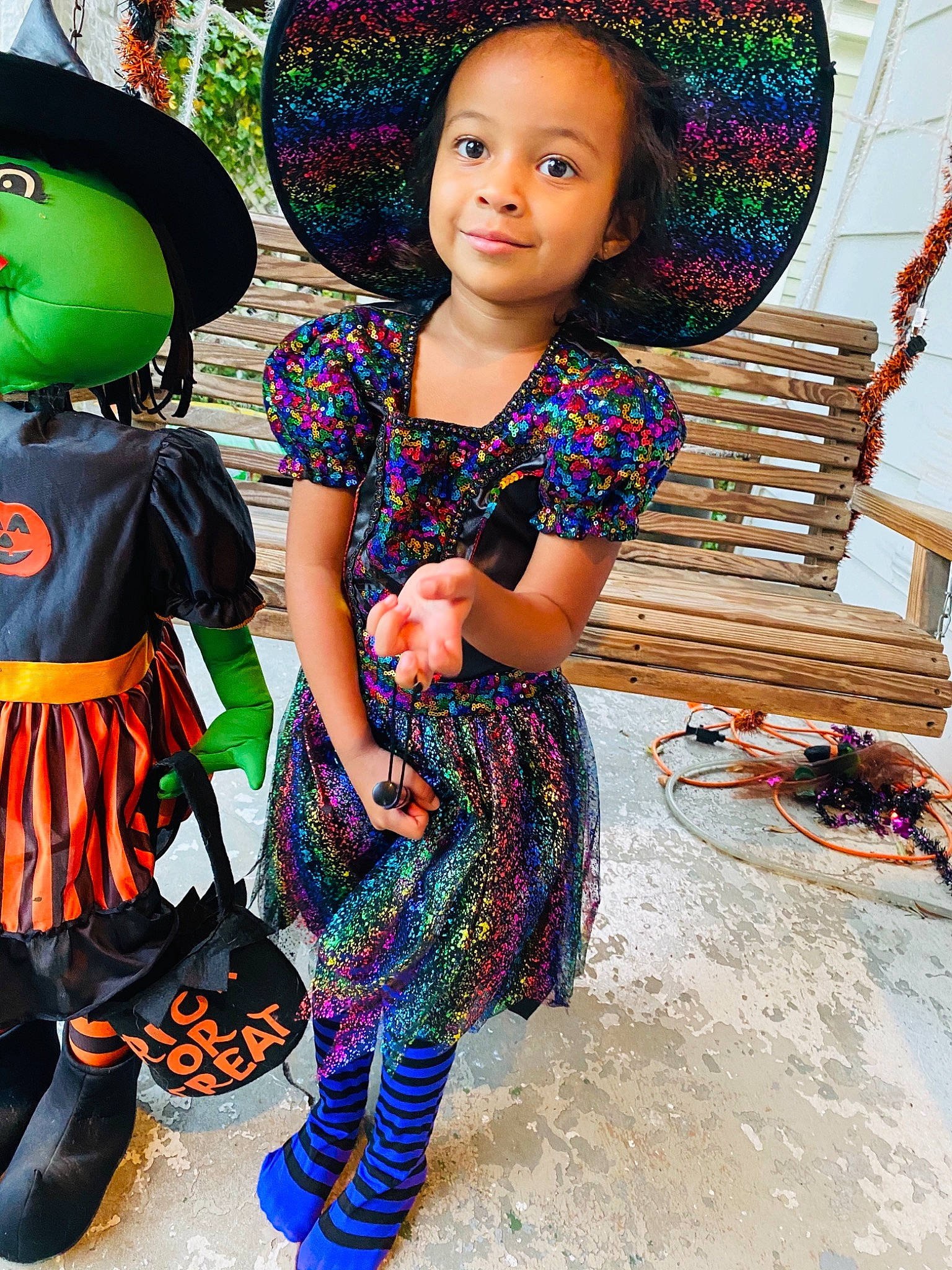 Kyra is registered to the contest to win money with this photo: beauty, black_hair, child, cool, electric_blue, event, fashion_accessory, fashion_design, flash_photography, fun, happy, joy, leisure, neck, organ, pattern, person, sleeve, smile, street_fashion