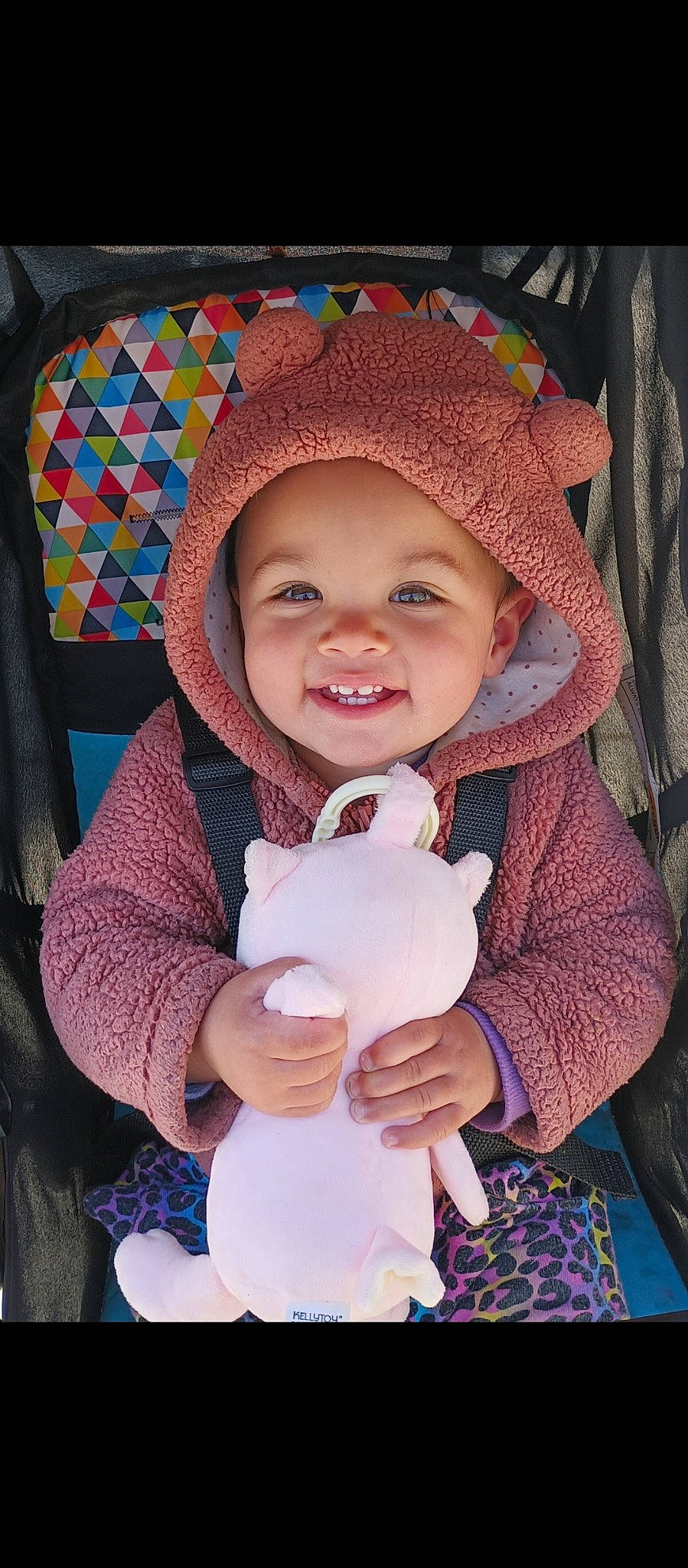 Amelia Rose joined the competition — help win amazing prizes! baby, baby_toddler_clothing, cheek, clothing, facial_expression, happy, headgear, headwear, iris, organ, outerwear, person, pink, product, purple, skin, sleeve, smile, textile, toddler