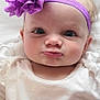 Adaley is registered to the contest to win money with this photo: baby, baby_girl, blanket, child, close_up, clothing, colorful, cute, expression, eyes, face, flower, headband, infant, lips, lying_down, portrait, purple, soft_texture, white
