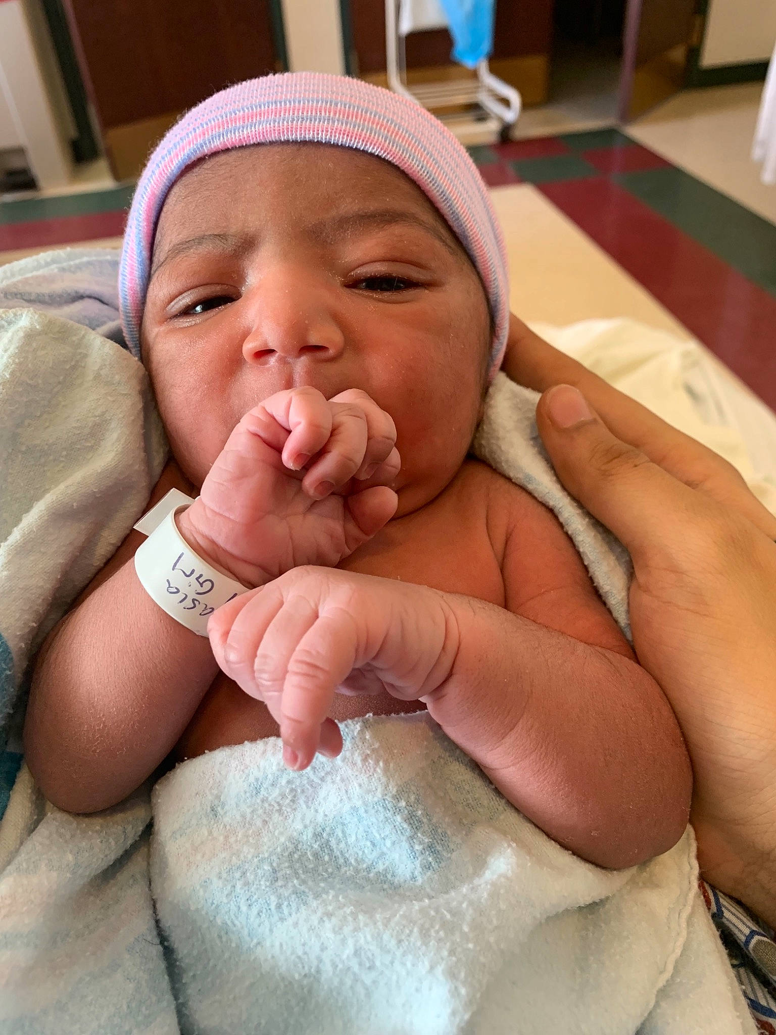 Cattleya is registered to the contest to win money with this photo: baby, birth, child, finger, hand, headwear, joy, nose, person, skin, thumb, toddler