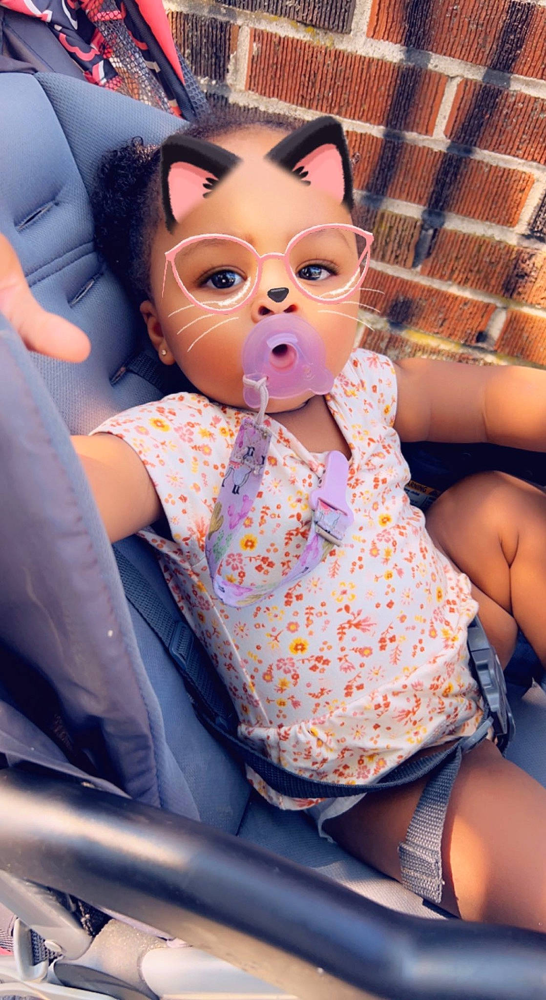 Jasmin is registered to the contest to win money with this photo: child, costume, doll, entertainment, event, eyewear, fun, fur, happy, leisure, mask, masque, pattern, person, personal_protective_equipment, plastic, sitting, sunglasses, thigh, toy