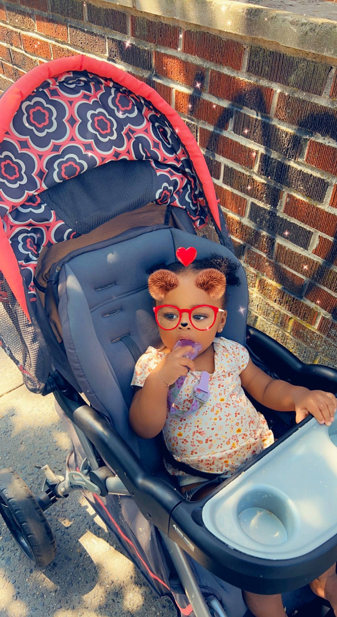 Jasmin is registered to the contest to win money with this photo: automotive_design, automotive_tire, azure, child, electric_blue, eyewear, fun, glasses, hat, leisure, motor_vehicle, person, pink, purple, sitting, snapshot, sunglasses, toddler, trunk, vehicle_door