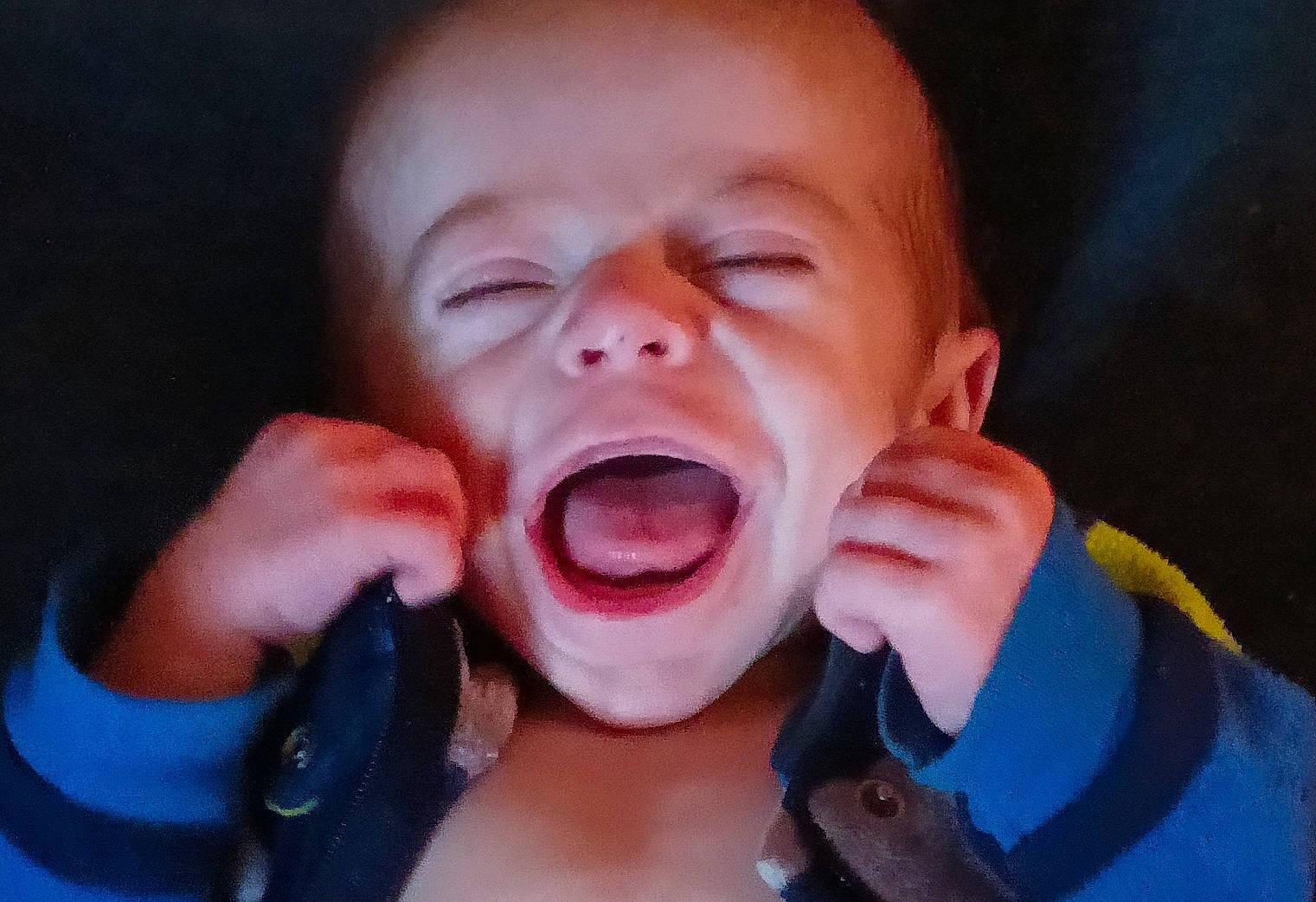 Aidyn is registered to the contest to win money with this photo: baby, cheek, close_up, clothing, ear, eyelash, finger, fun, gesture, happy, hearing, jaw, lip, mouth, nose, person, shout, thumb, toddler, tongue
