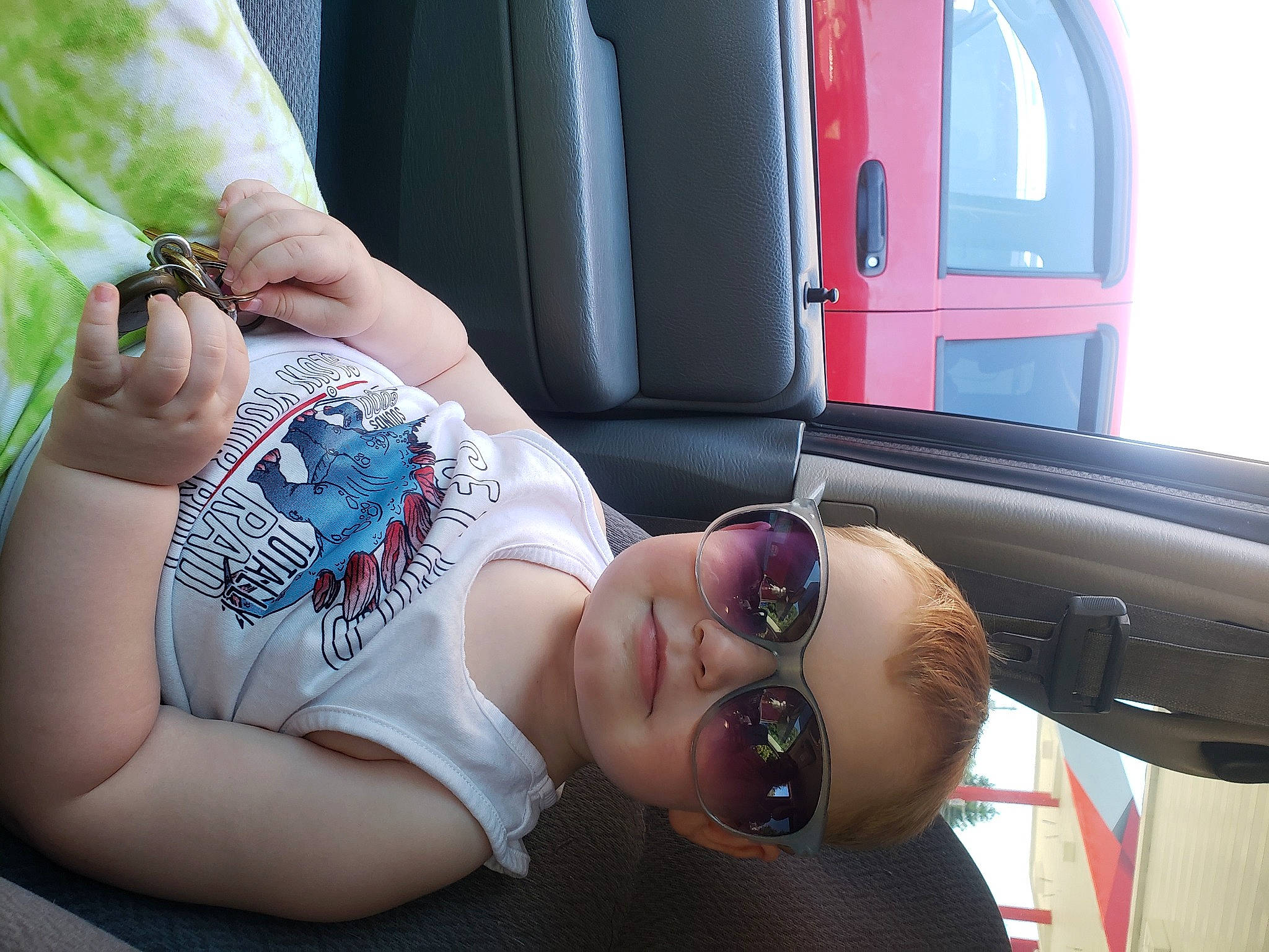 Raylan is registered to the contest to win money with this photo: automotive_design, automotive_exterior, automotive_lighting, automotive_tire, bumper, car, chest, elbow, eyewear, finger, glasses, land_vehicle, motor_vehicle, person, sunglasses, thigh, trunk, vehicle, vehicle_door, vision_care