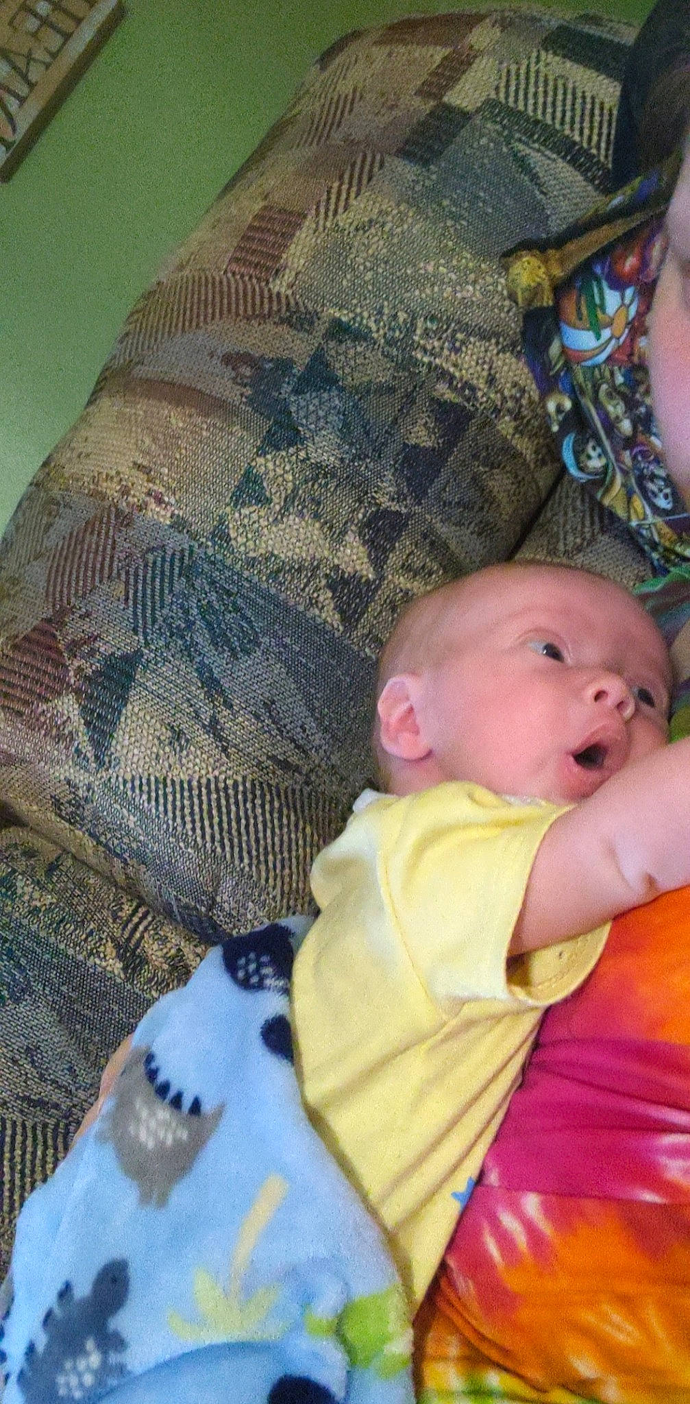 Maison is registered to the contest to win money with this photo: baby, baby_products, baby_toddler_clothing, bedtime, cheek, child, comfort, couch, grass, iris, lap, linens, pattern, person, room, sitting, skin, textile, toddler, wood