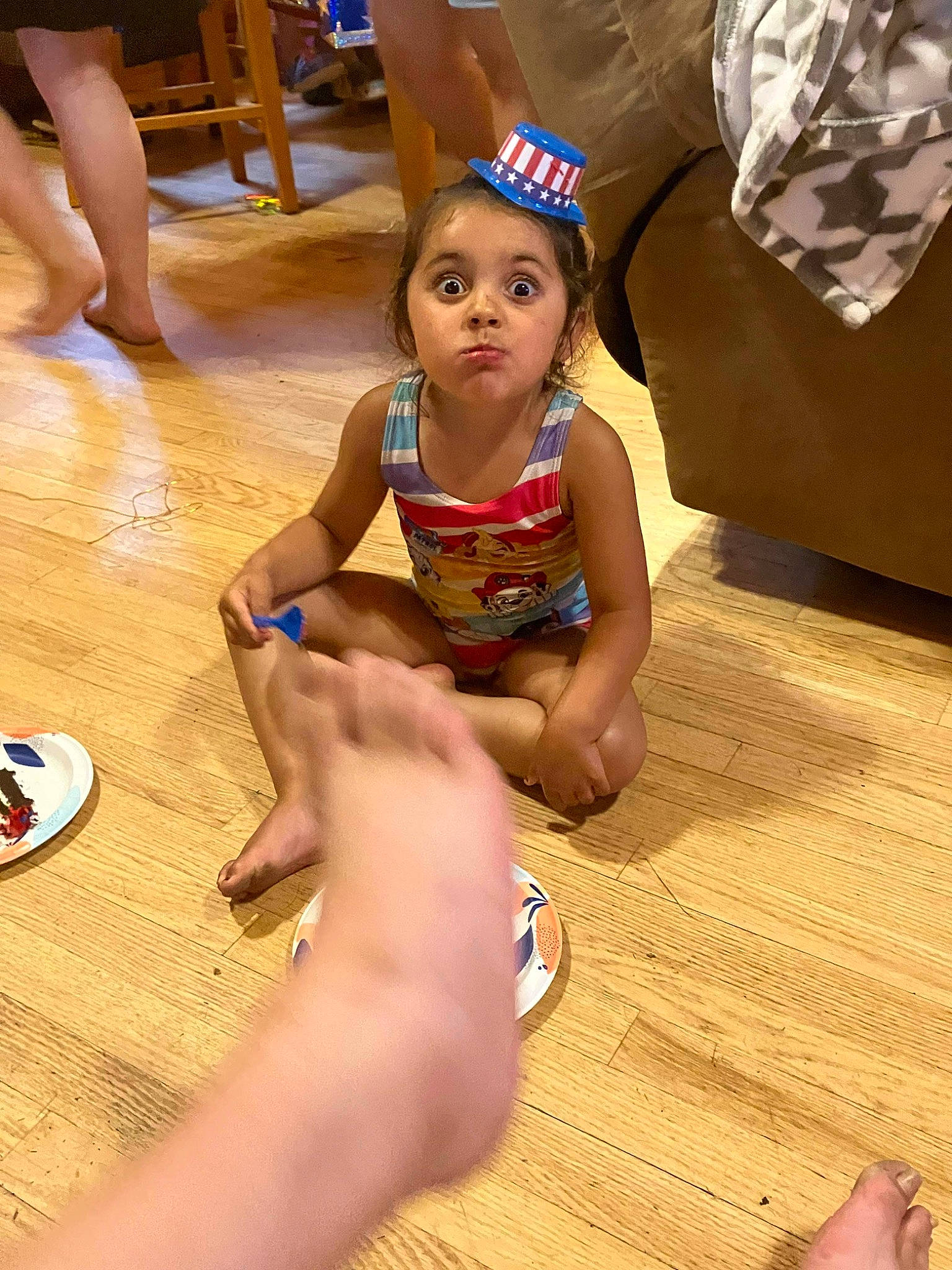 Meela joined the competition — help win amazing prizes! barefoot, child, elbow, face, finger, floor, flooring, foot, fun, happy, human_leg, joint, knee, leg, leisure, person, sandal, surprise, thigh, toddler