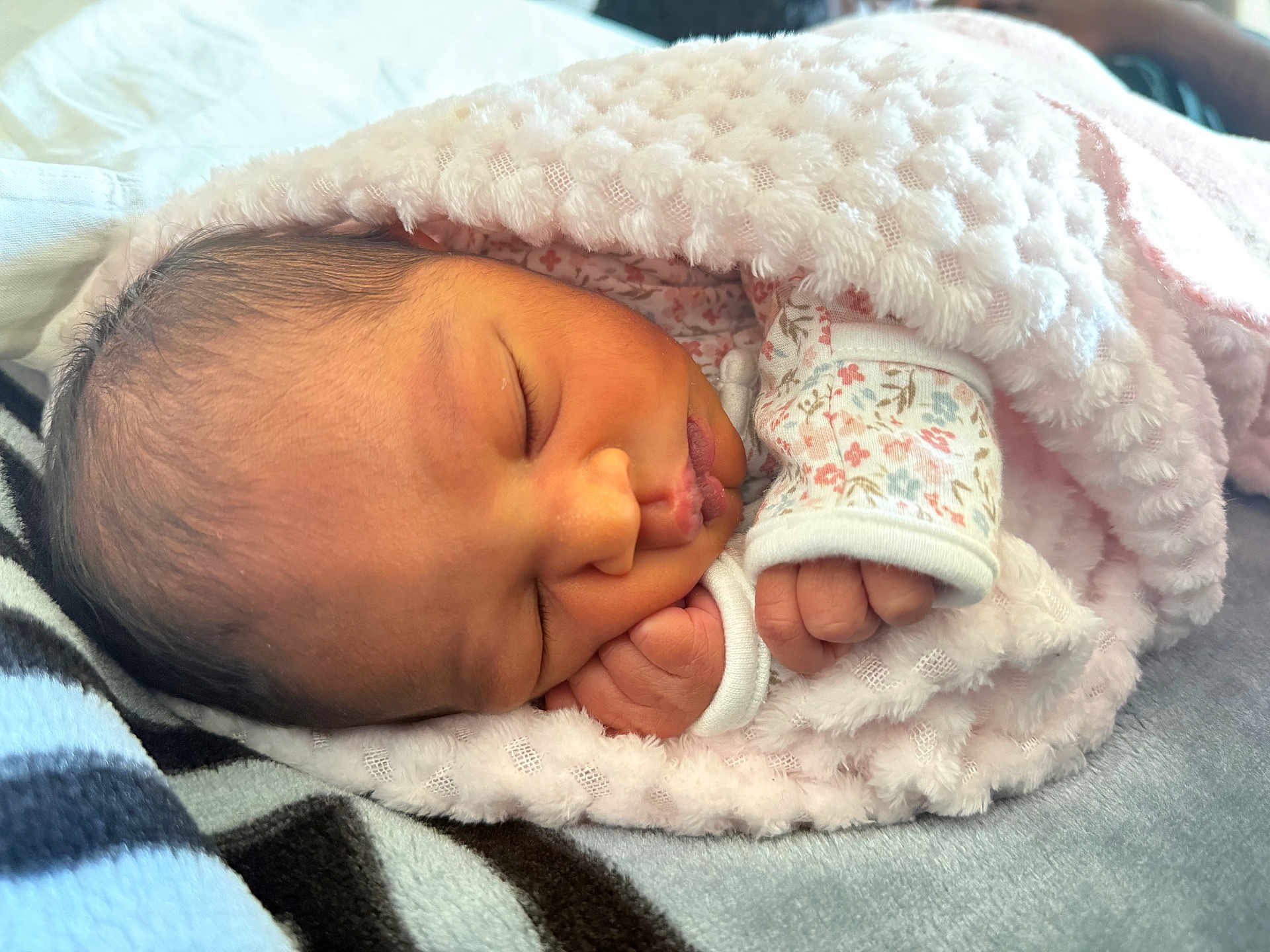 Ayali joined the competition — help win amazing prizes! newborn, baby, sleeping, blanket, pink, cozy, infant, face, hand, soft, cute, clothing, floral_pattern, wrapped, resting, peaceful, closeup, indoors, tiny, portrait