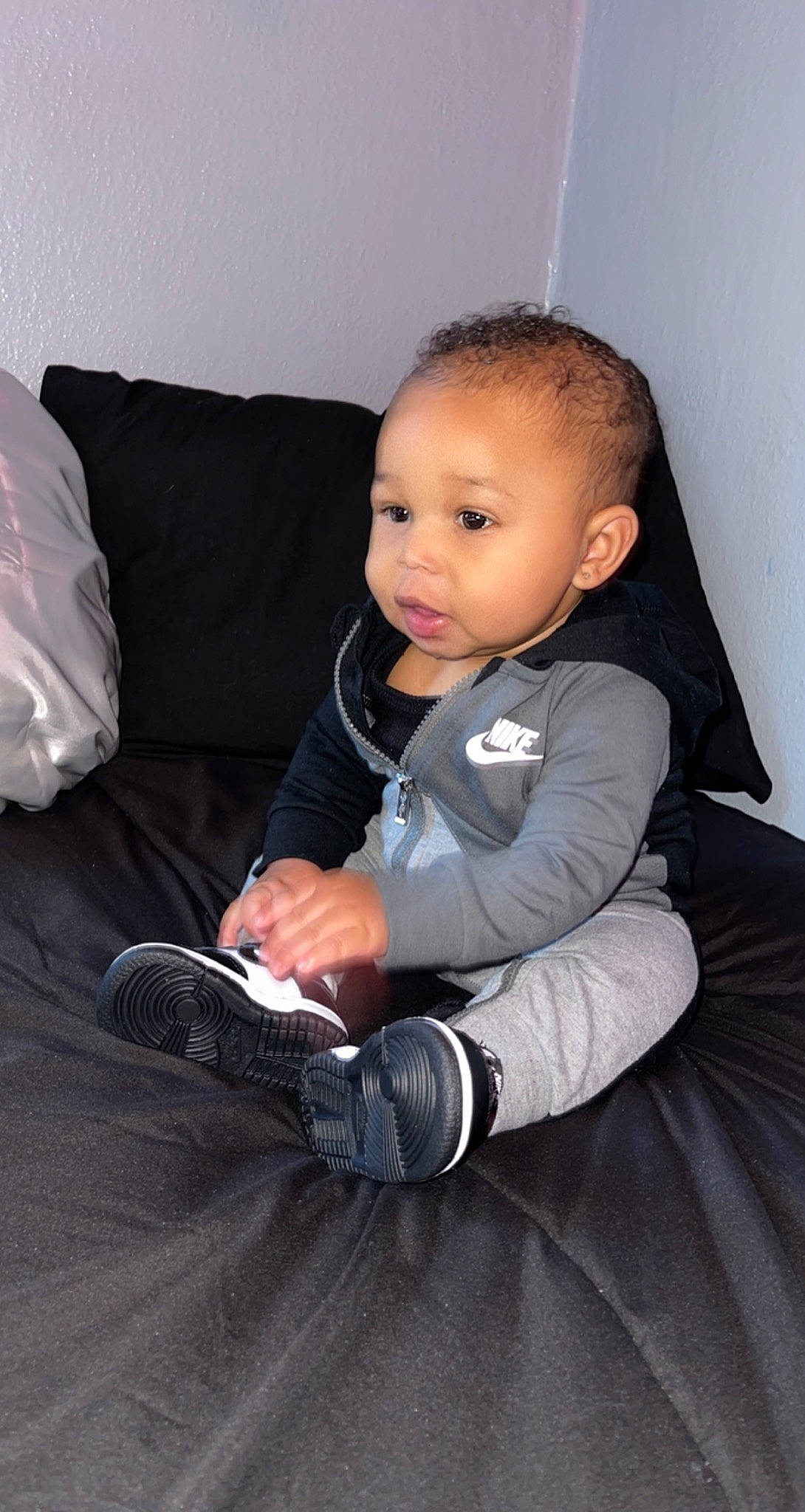 Cartiér is registered to the contest to win money with this photo: baby, baby_toddler_clothing, cheek, child, comfort, couch, elbow, eye, flash_photography, flooring, fun, head, human_leg, knee, lap, person, room, sitting, skin, sleeve