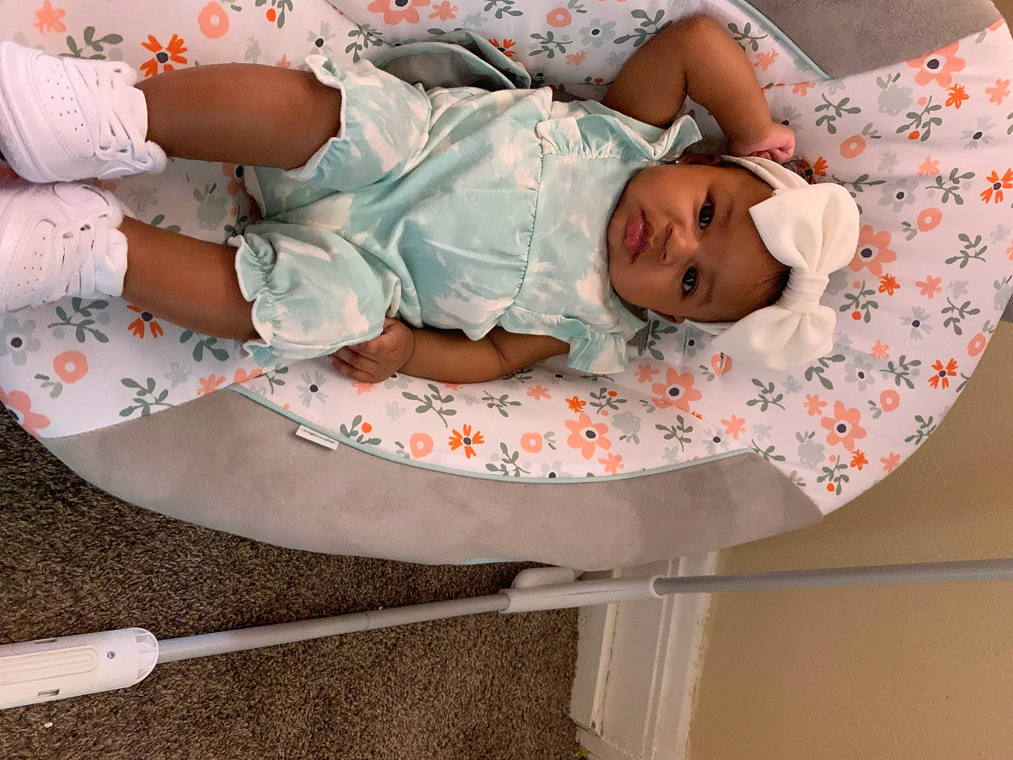 Azuri is registered to the contest to win money with this photo: arm, baby, baby_products, baby_sleeping, baby_toddler_clothing, child, comfort, diaper, hand, hat, headwear, human_body, kitchen_utensil, linens, pattern, person, pink, room, sleep, toddler