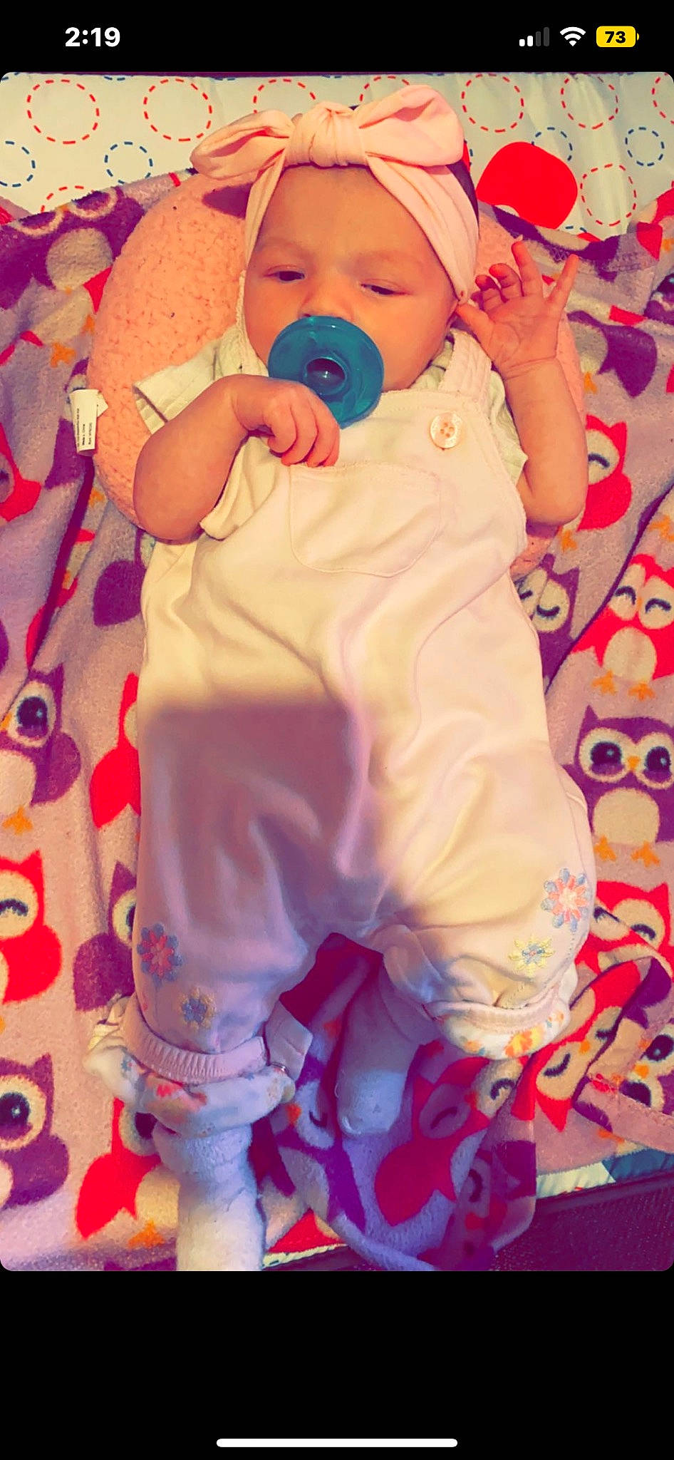 Annsleigh is registered to the contest to win money with this photo: baby, baby_products, baby_safety, baby_sleeping, baby_toddler_clothing, cheek, child, comfort, happy, headwear, linens, magenta, nail, pattern, person, pink, play, product, purple, sleeve