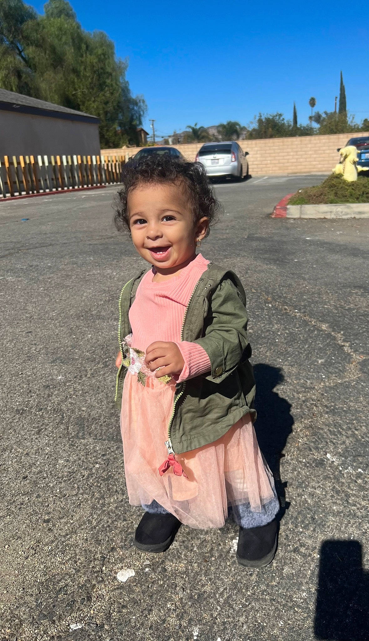 Ayla joined the competition — help win amazing prizes! asphalt, car, child, family_car, fun, grass, happy, joy, landscape, leisure, person, public_space, recreation, road, road_surface, sky, smile, soil, toddler, travel