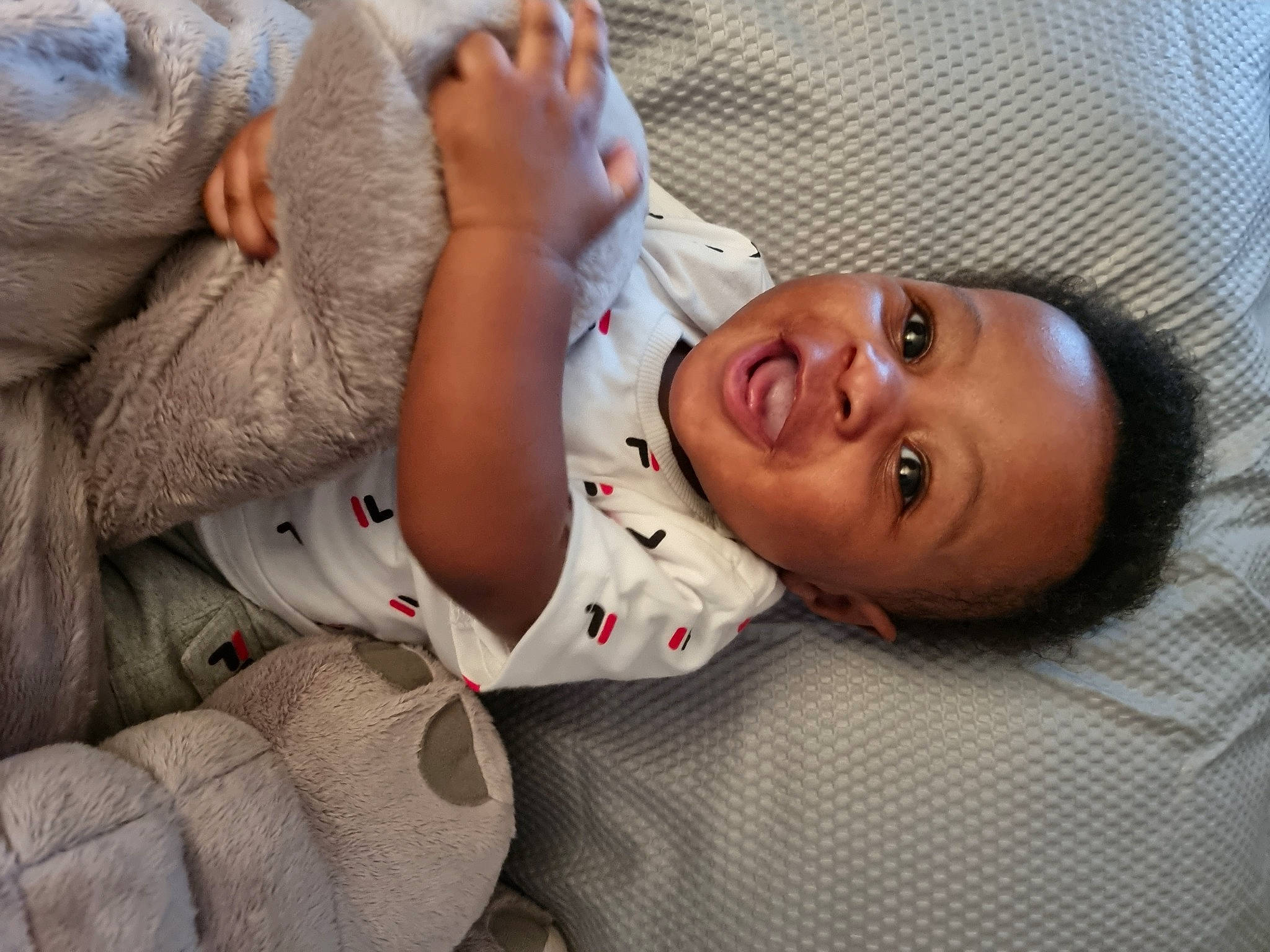 Reign-kreed joined the competition — help win amazing prizes! baby, baby_toddler_clothing, cheek, chin, comfort, elbow, finger, gesture, hand, happy, linens, lip, mouth, neck, nose, person, skin, sleeve, smile, textile