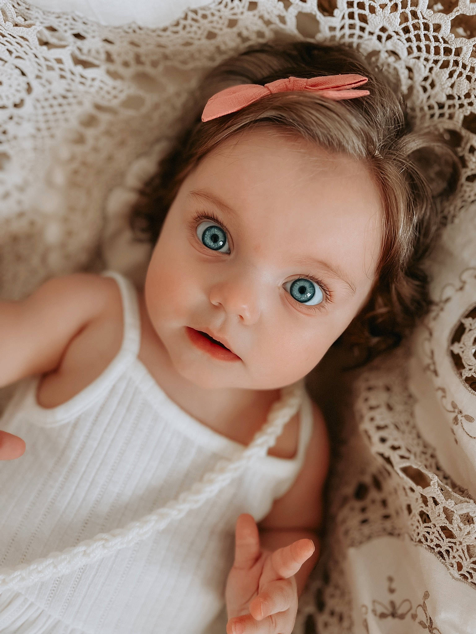 Maelyn is registered to the contest to win money with this photo: baby, baby_toddler_clothing, cap, cheek, chin, dress, eye, eyebrow, eyelash, flash_photography, happy, head, headgear, iris, lip, long_hair, person, skin, sleeve, textile