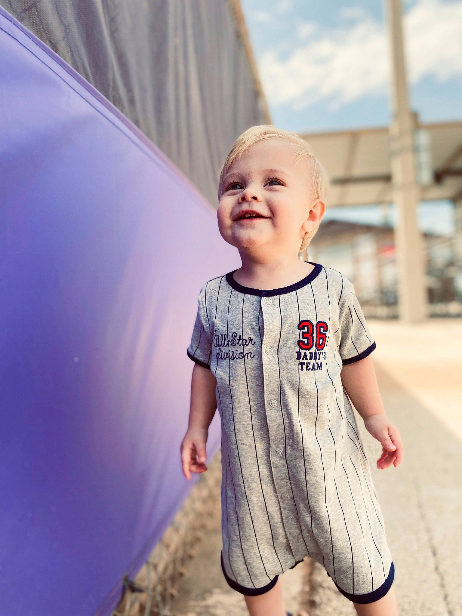 Kason joined the competition — help win amazing prizes! baby, child, eye, face, facial_expression, head, joy, people, person, photograph, pink, shoulder, skin, sleeve, smile, snapshot, standing, summer, t_shirt, toddler