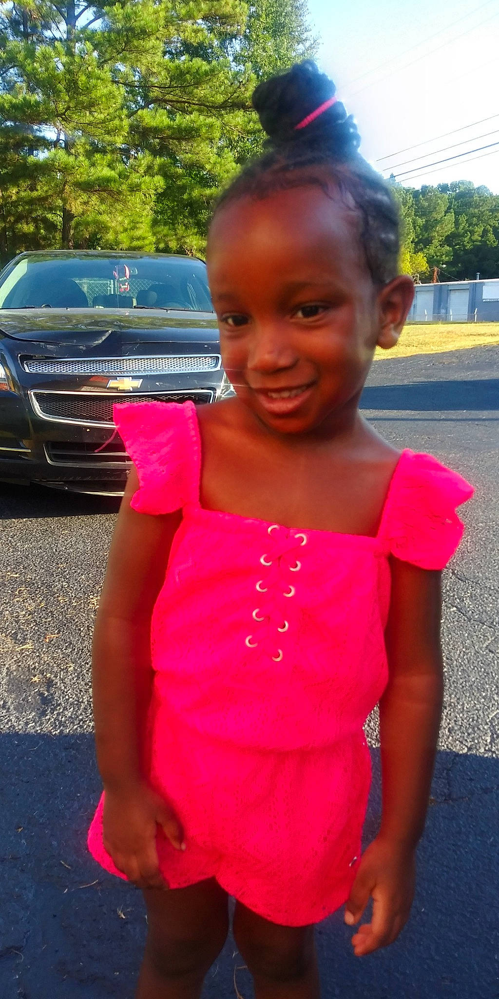 Devyn joined the competition — help win amazing prizes! automotive_exterior, car, child, family_car, joy, luxury_vehicle, magenta, mid_size_car, person, pink, shoulder, smile, summer, toddler, vacation, vehicle, vehicle_door