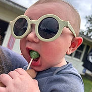 Hendrick joined the competition — help win amazing prizes! baby, cheek, child, clothing, cloudy, cute, face, fun, hand, head, house, lollipop, mouth, outdoor, person, reflection, sky, summer, sunglasses, window