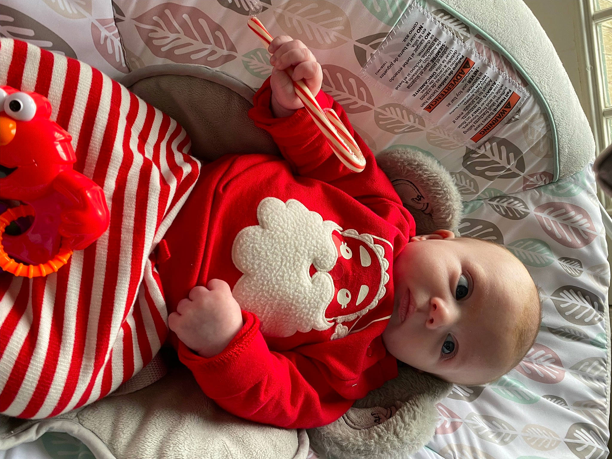 Lennox joined the competition — help win amazing prizes! baby, baby_products, baby_sleeping, baby_toddler_clothing, carmine, child, comfort, event, headgear, holiday, linens, pattern, person, red, room, santa_claus, skin, sleeve, sock, textile