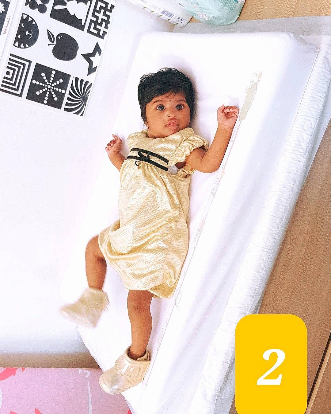 Thivisha a rejoint le concours — aidez-le/la à gagner de superbes lots ! baby, baby_toddler_clothing, day_dress, dress, fashion_design, flooring, happy, human_leg, knee, linens, magenta, one_piece_garment, pattern, person, product, sandal, sleeve, thigh, toddler, waist