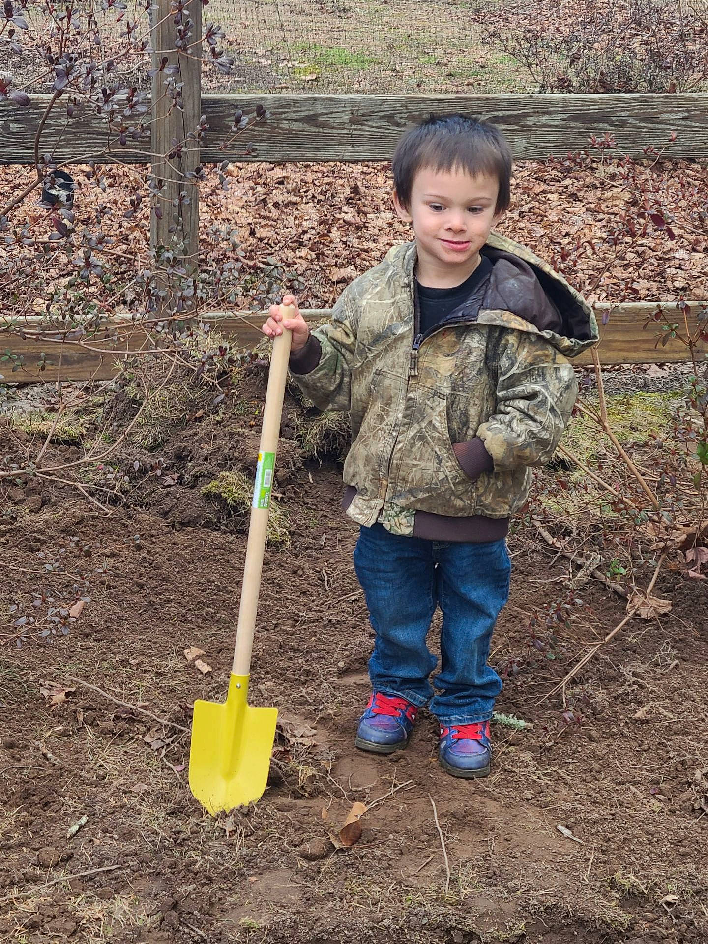 Austin joined the competition — help win amazing prizes! agriculture, arbor_day, child, fence, field, garden_tool, gardening, grass, people_in_nature, person, plantation, play, shovel, sleeve, soil, toddler