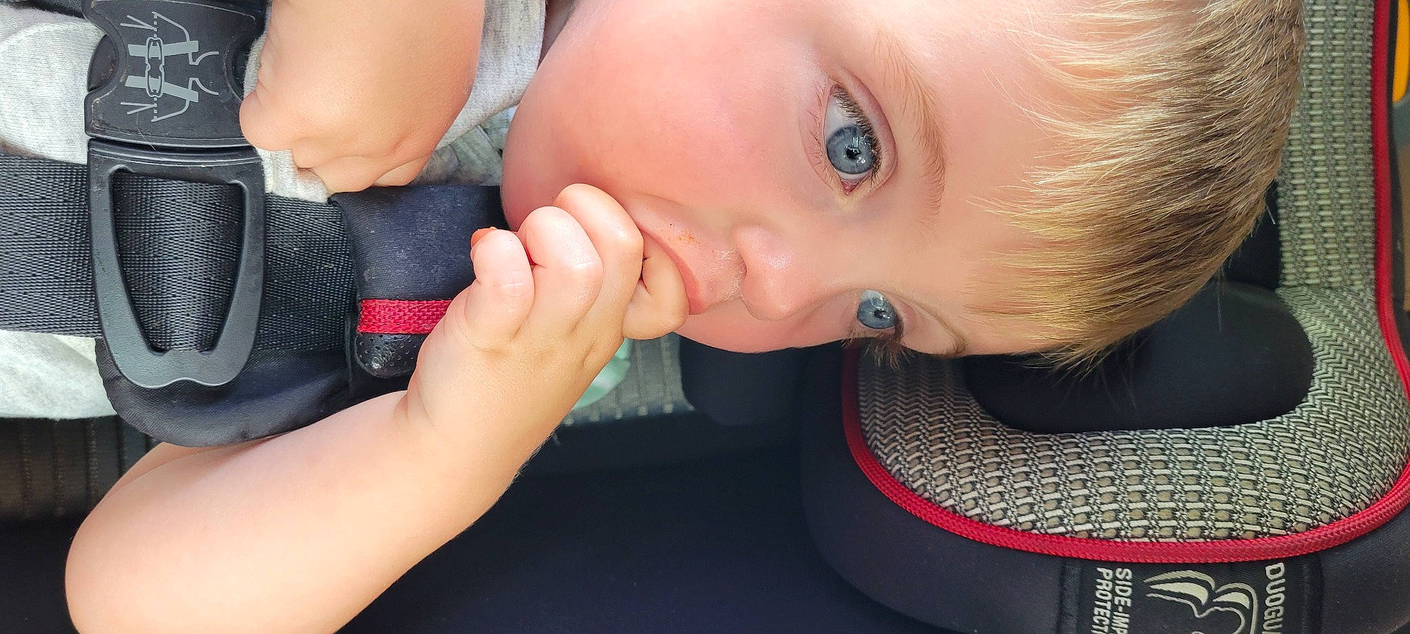 John is registered to the contest to win money with this photo: arm, baby, baby_toddler_clothing, cheek, dress, ear, eye, eyebrow, eyelash, finger, gesture, hand, happy, human_body, iris, lip, mouth, neck, nose, person