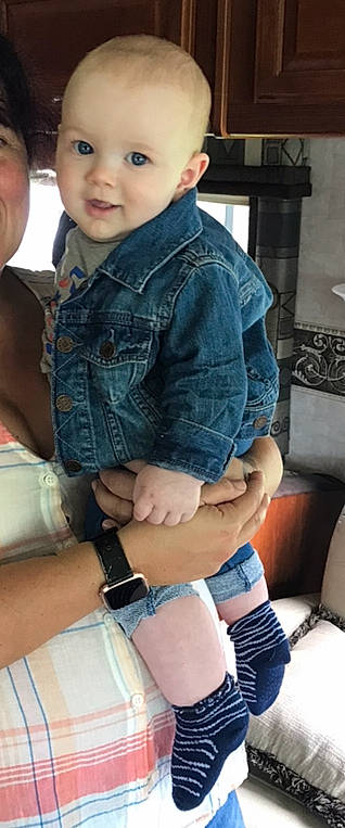 Braiden joined the competition — help win amazing prizes! abdomen, arm, cheek, child, denim, finger, hand, human_leg, jeans, joint, knee, leg, person, sitting, thigh, thumb, toddler, trunk