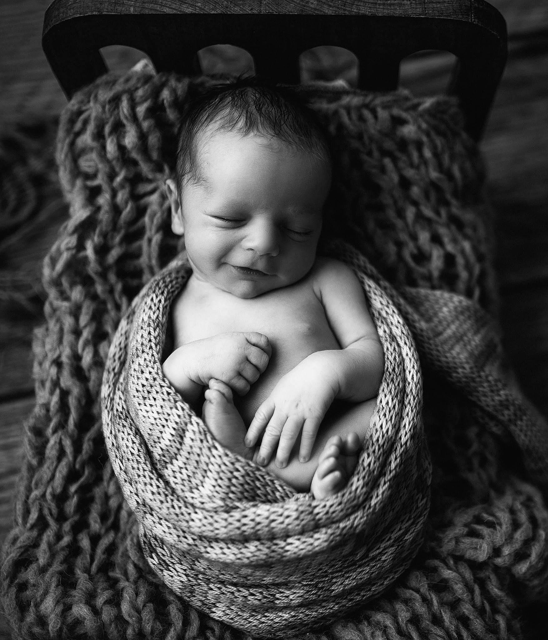 Niko is registered to the contest to win money with this photo: arm, black, black_and_white, flash_photography, gesture, grass, grey, hand, happy, human_body, iris, organ, person, photograph, plant, skin, smile, style, toddler, tree