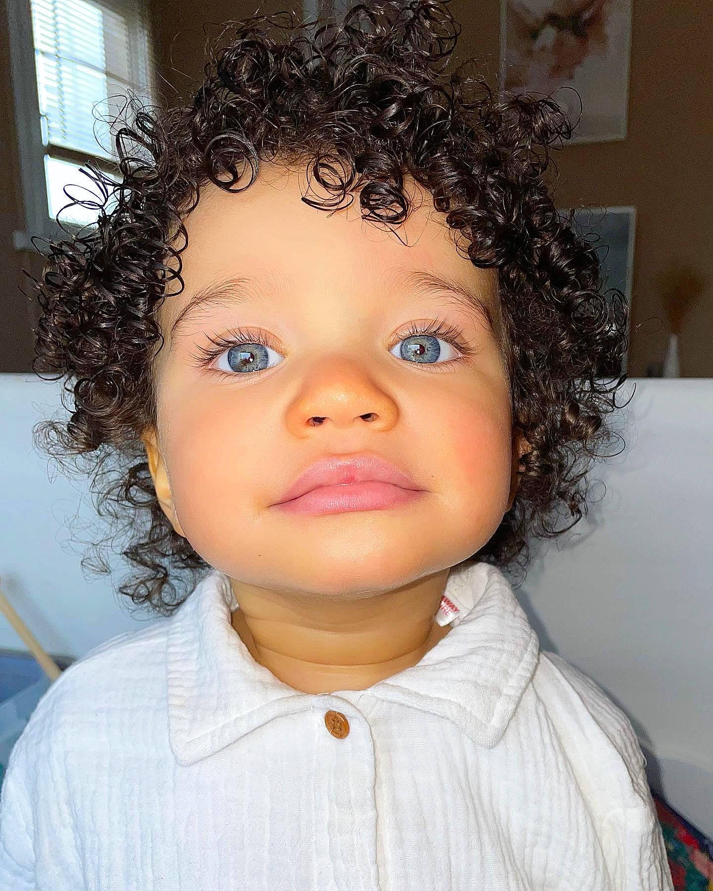 Nell participe au concours pour gagner de l'argent avec cette photo : afro, cheek, chin, cool, ear, eye, eyebrow, eyelash, facial_expression, forehead, hair, hairstyle, human_body, iris, jheri_curl, lip, nose, person, ringlet, shoulder