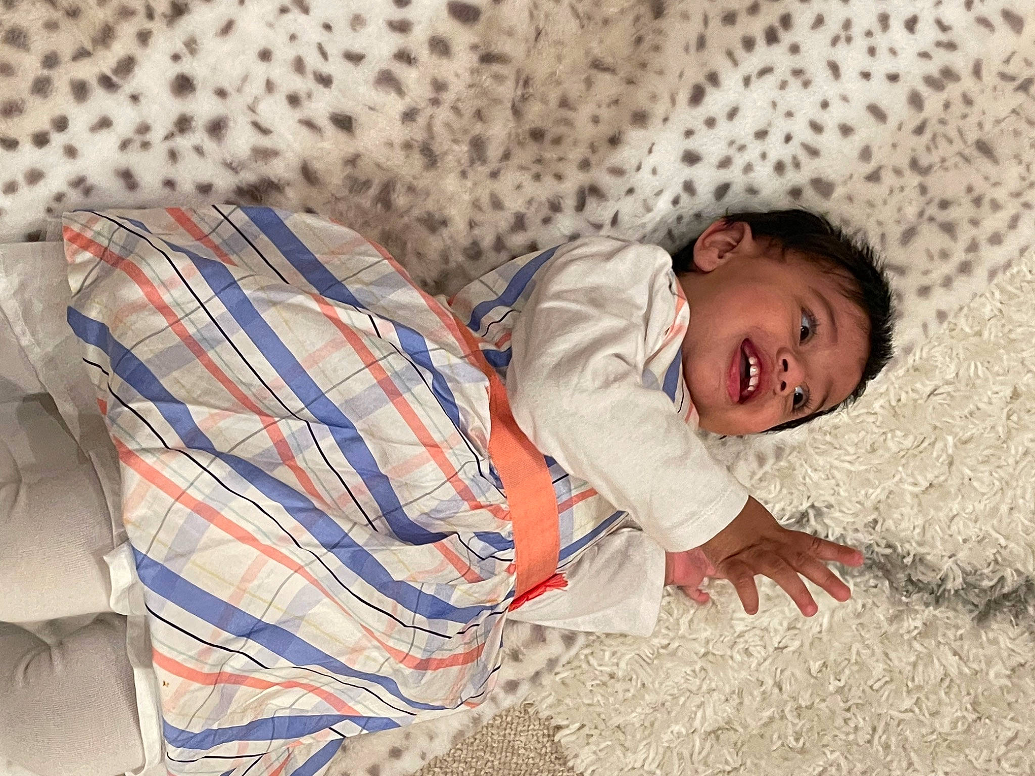 Anaya joined the competition — help win amazing prizes! baby, baby_toddler_clothing, child, comfort, flooring, fun, grass, happy, human_leg, linens, nap, pattern, person, sitting, sleep, smile, toddler, vacation, wood