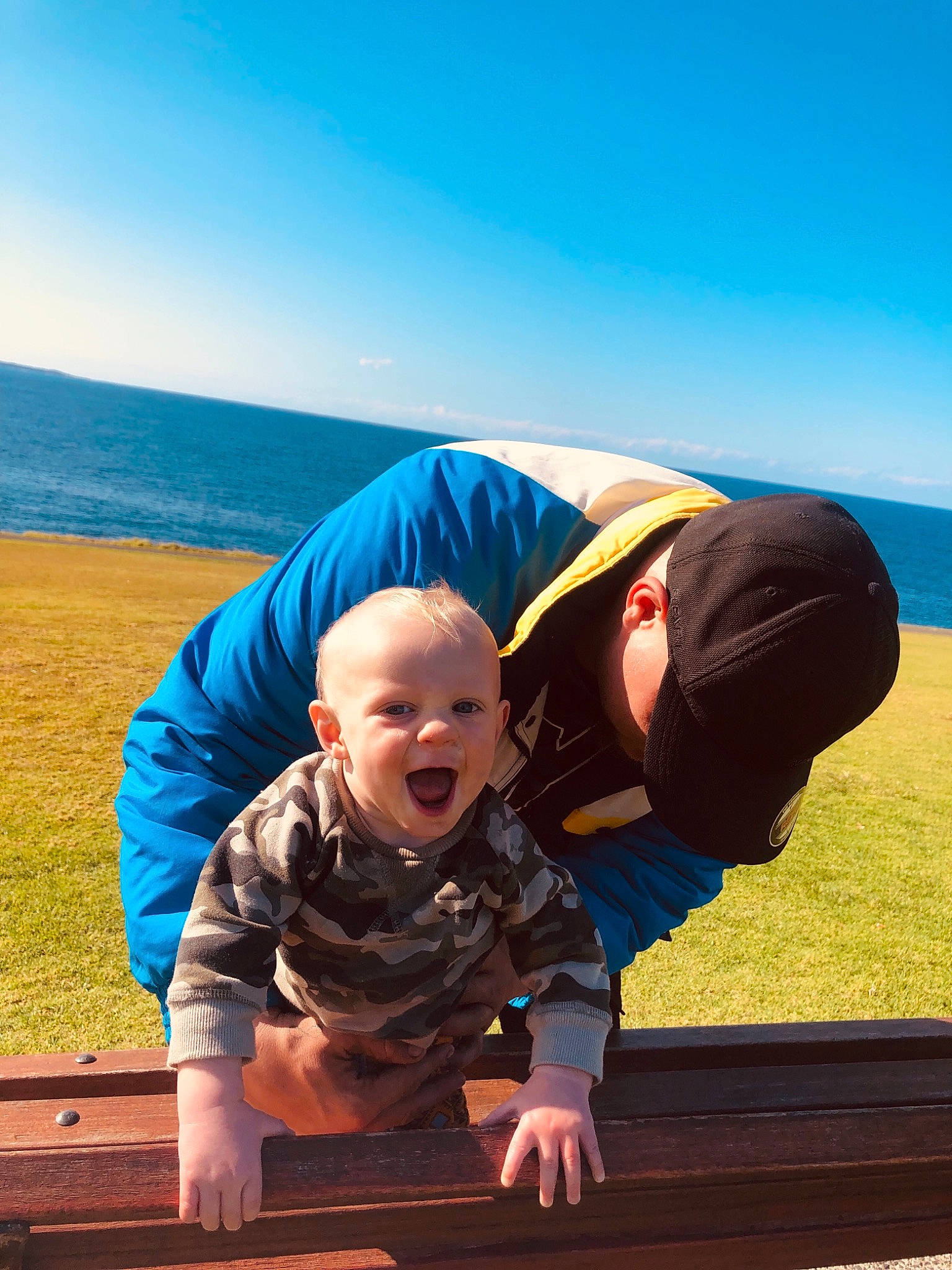 Malakye is registered to the contest to win money with this photo: blue, child, cloud, grass, happy, landscape, leisure, person, photography, play, sand, sitting, sky, smile, toddler, travel, vacation