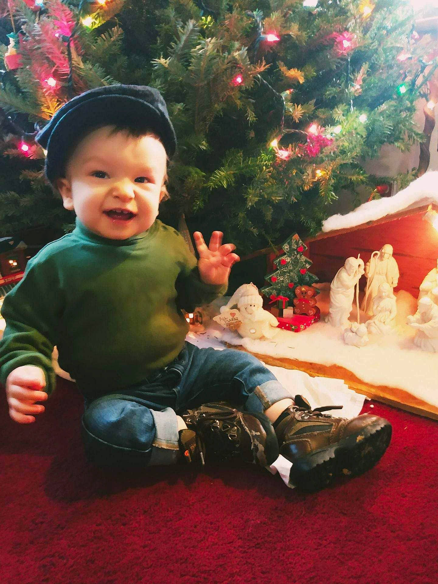 Brent joined the competition — help win amazing prizes! baby_toddler_clothing, christmas, christmas_decoration, christmas_eve, christmas_ornament, christmas_tree, conifer, event, fun, happy, holiday, holiday_ornament, interior_design, lap, ornament, people_in_nature, person, sitting, smile, toddler