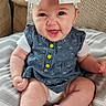Eleanor joined the competition — help win amazing prizes! baby, child, smile, bow, headband, cushion, blanket, sitting, happy, cute, infant, clothing, white_socks, denim_dress, indoors, portrait, face, legs, arm, cozy