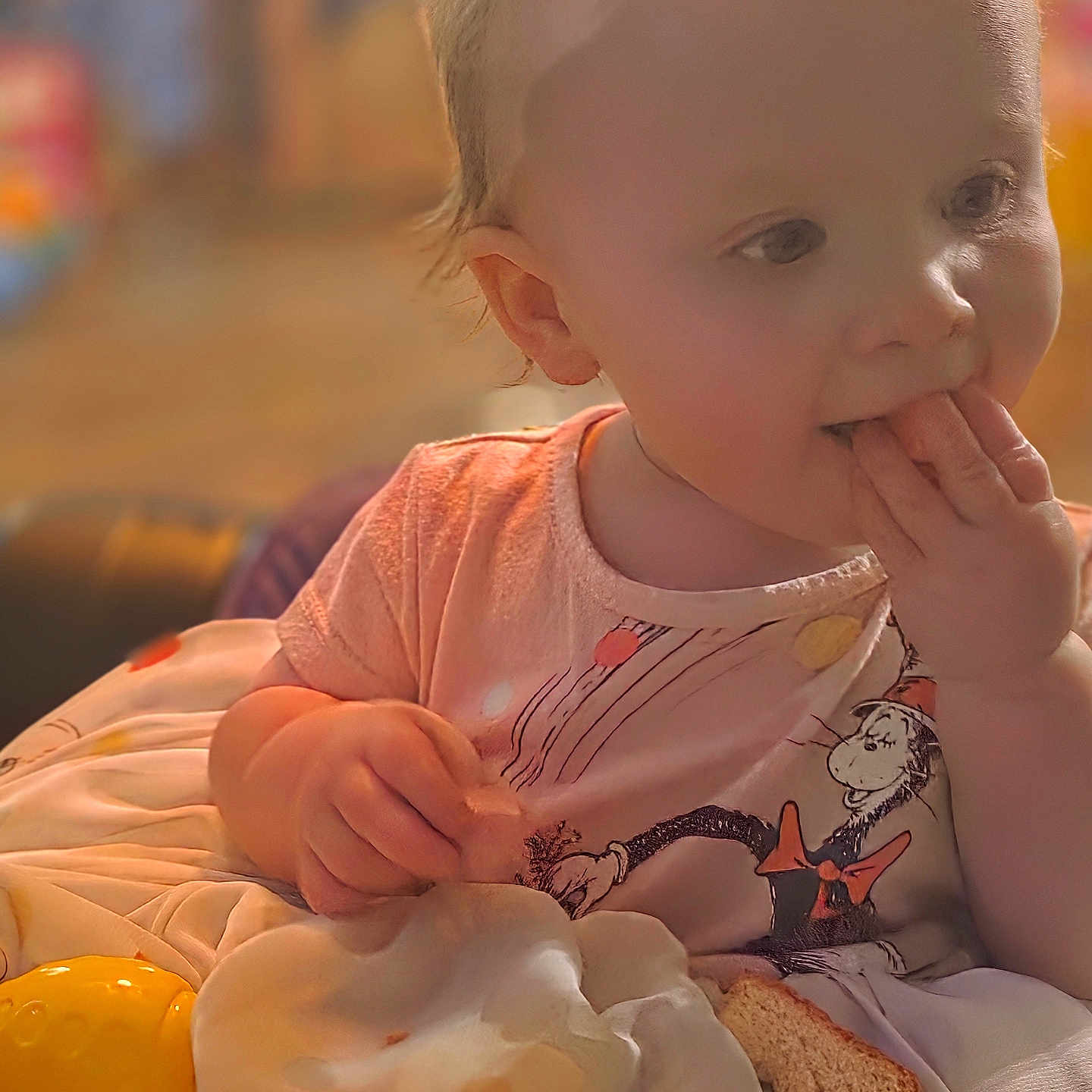 Raylan is registered to the contest to win money with this photo: baby, bodypart, bread, couch, cream, dessert, eating, face, finger, food, furniture, hand, head, icing, newborn, person, photography, portrait, sitting, sweets