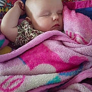 Hope joined the competition — help win amazing prizes! baby, sleeping, blanket, pink, cozy, infant, child, face, peaceful, soft, pattern, colorful, rest, cute, young, portrait, wrapped, comfort, indoors, relaxation