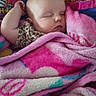 baby, sleeping, blanket, pink, cozy, infant, child, face, peaceful, soft, pattern, colorful, rest, cute, young, portrait, wrapped, comfort, indoors, relaxation