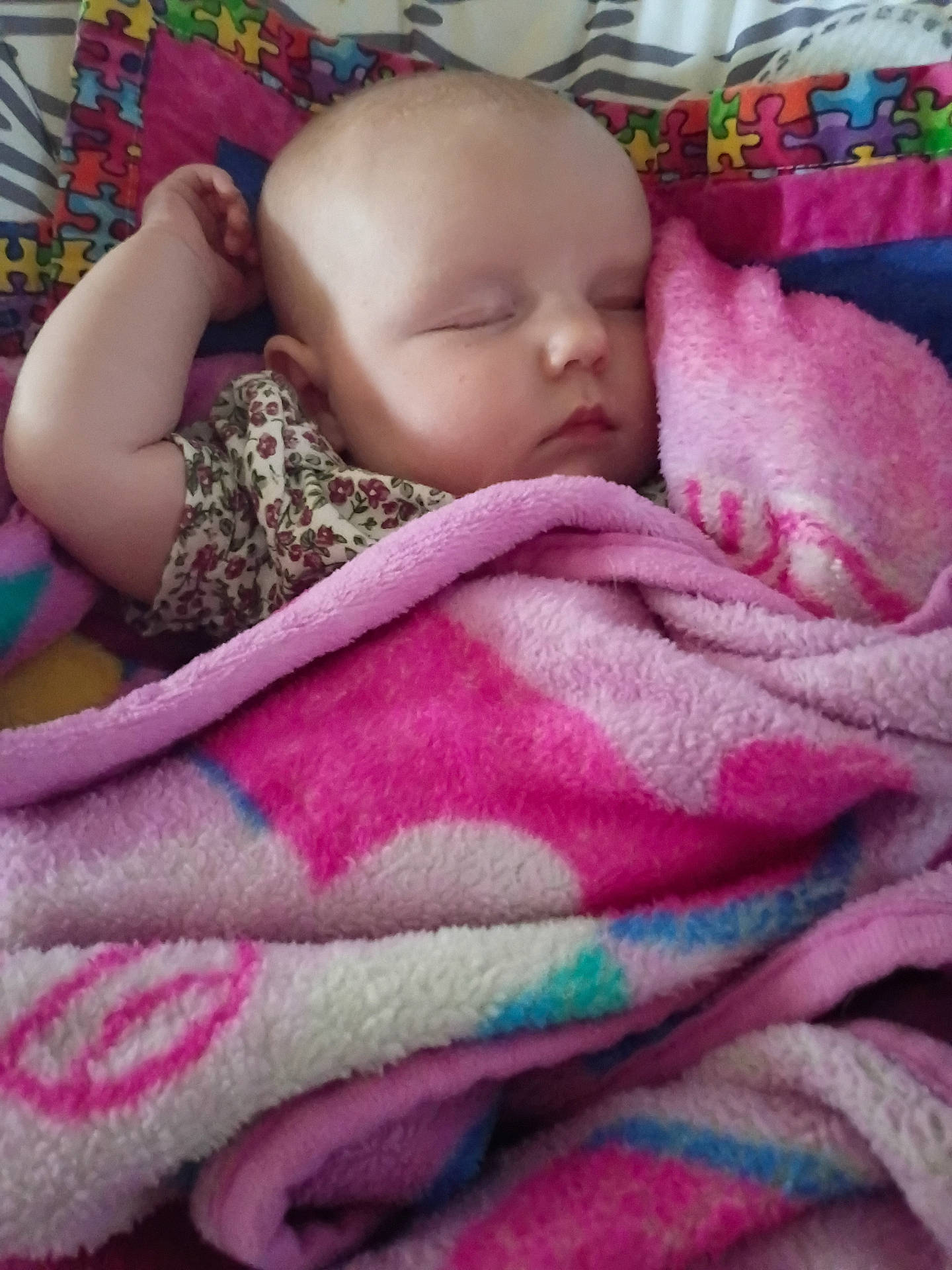 baby, blanket, child, clothing, colorful, cozy, cute, face, head, indoor, infant, peaceful, pink, portrait, puzzle_pattern, quilt, rest, sleeping, soft, toddler