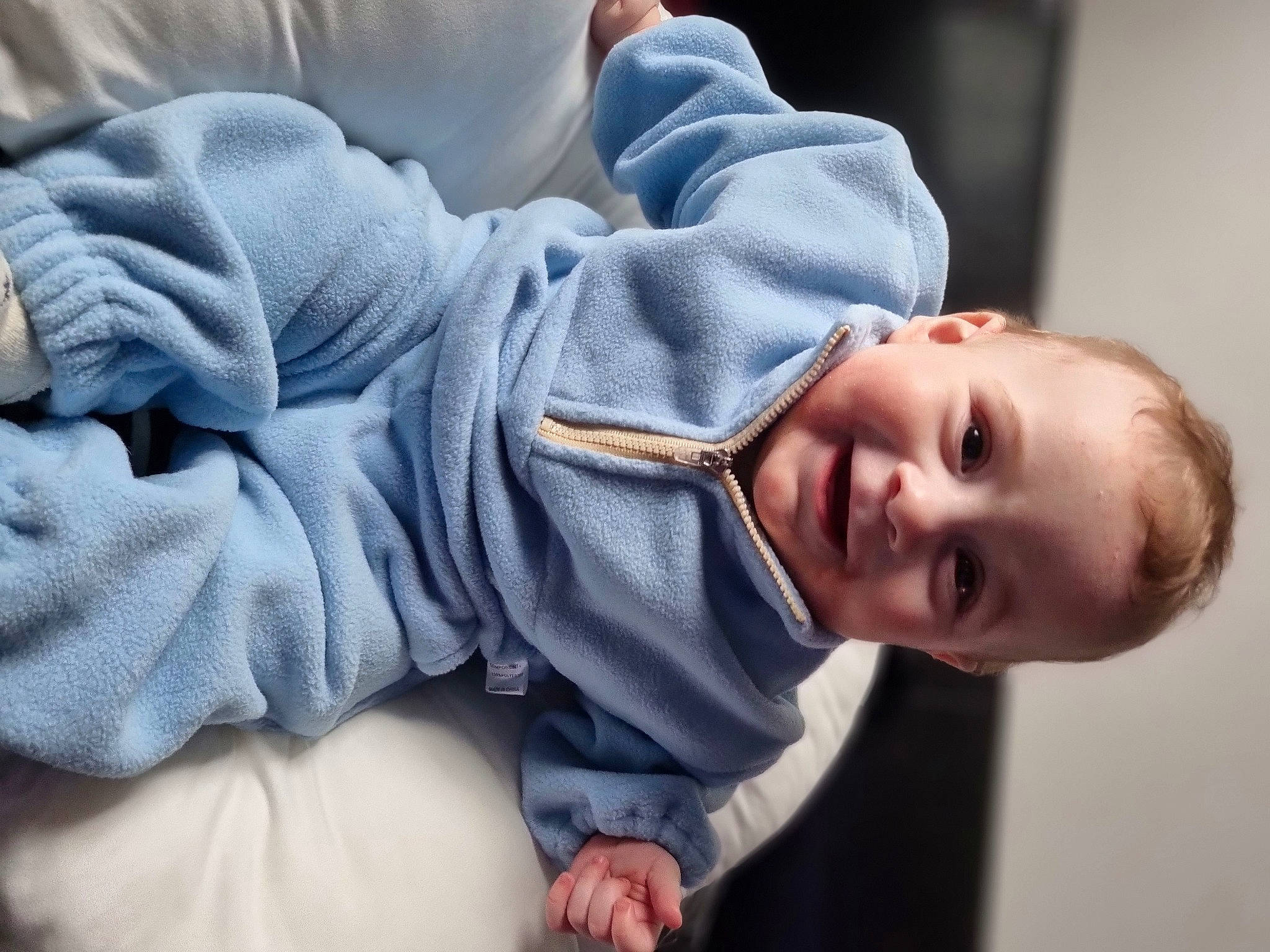 Riley joined the competition — help win amazing prizes! baby, baby_toddler_clothing, cheek, child, comfort, elbow, eye, flash_photography, gesture, happy, human_body, joint, joy, mouth, nose, person, skin, sleeve, smile, textile