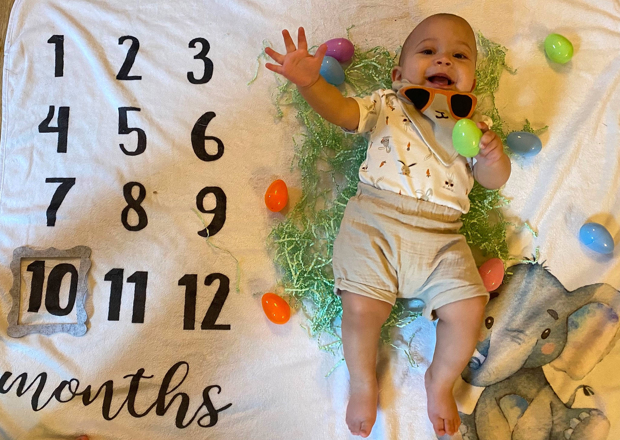 Zakai joined the competition — help win amazing prizes! baby, baby_toddler_clothing, beauty, child, event, facial_expression, fictional_character, finger, font, happy, pattern, people, person, photo_caption, skin, sleeve, smile, t_shirt, textile, thigh