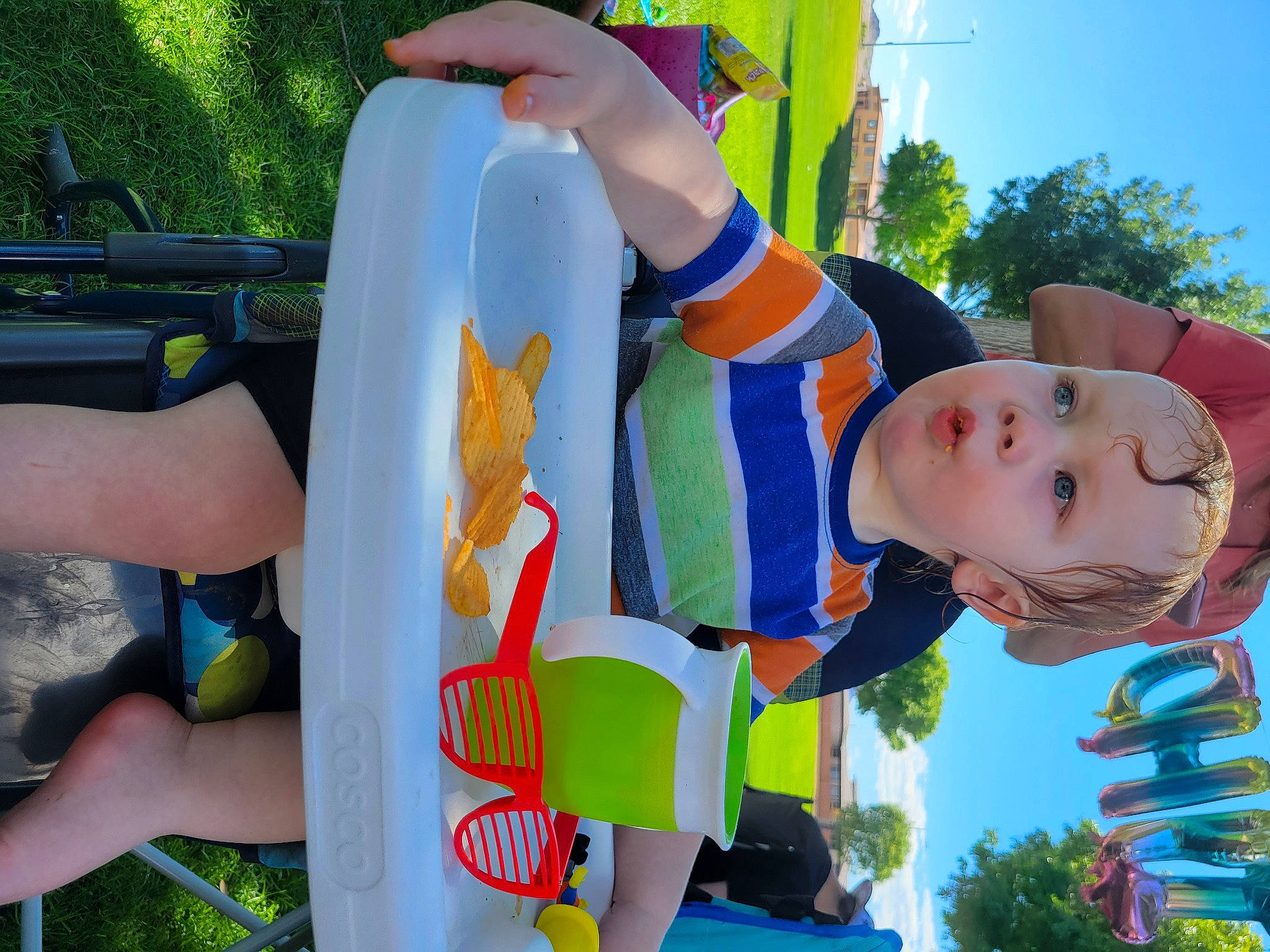 Cade joined the competition — help win amazing prizes! arm, child, city, event, fun, grass, green, happy, human_body, leisure, outdoor_play_equipment, person, plant, play, recreation, shorts, sky, surprise, thigh, toddler