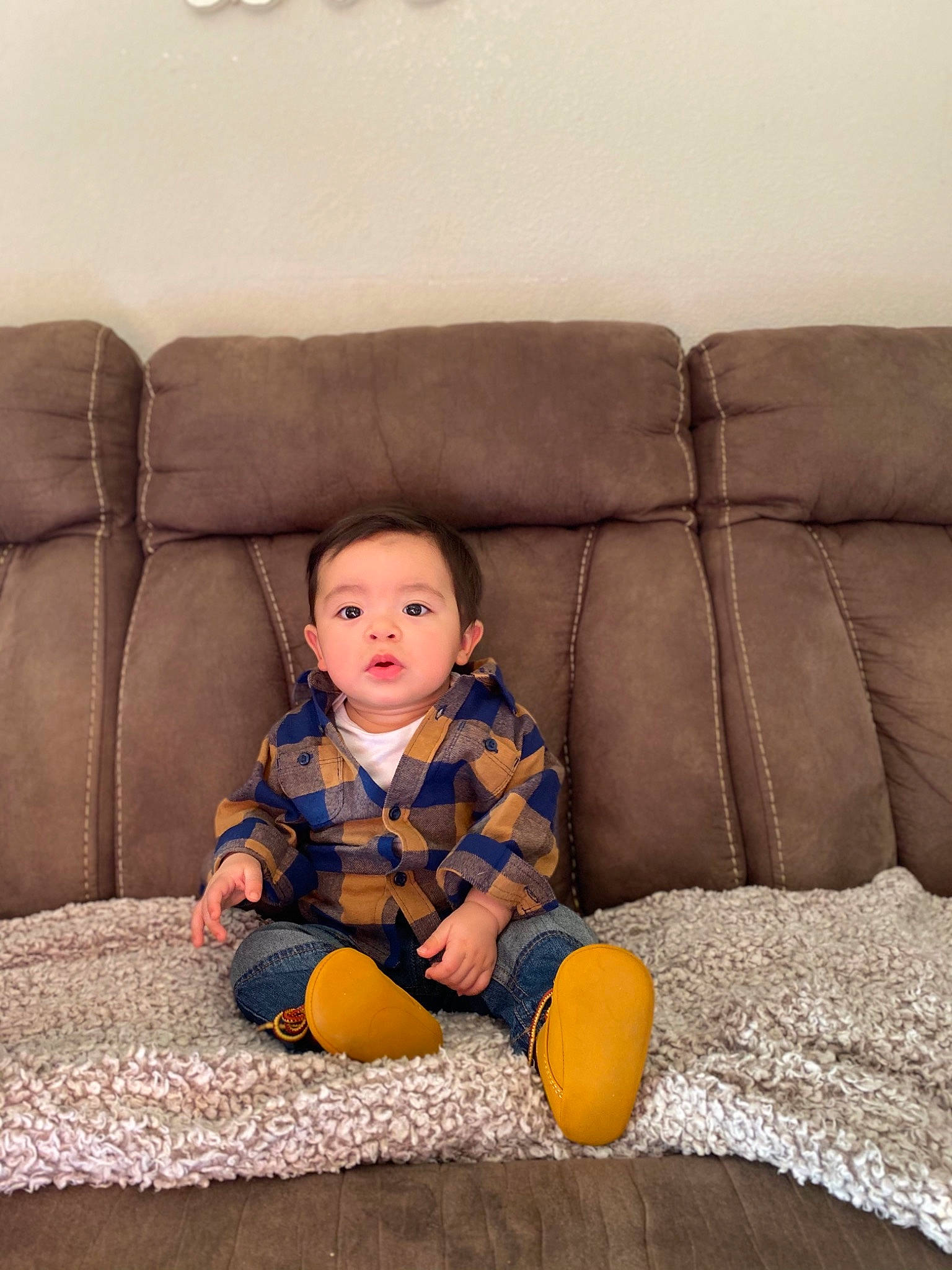 Azrael is registered to the contest to win money with this photo: baby, child, comfort, couch, furniture, person, play, sitting, toddler