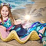 child, girl, mermaid_costume, shell, beach, sand, starfish, seashell, pearl, glowing_orb, costume, smiling, portrait, long_hair, blue, purple, jewelry, necklace, bracelet, fantasy