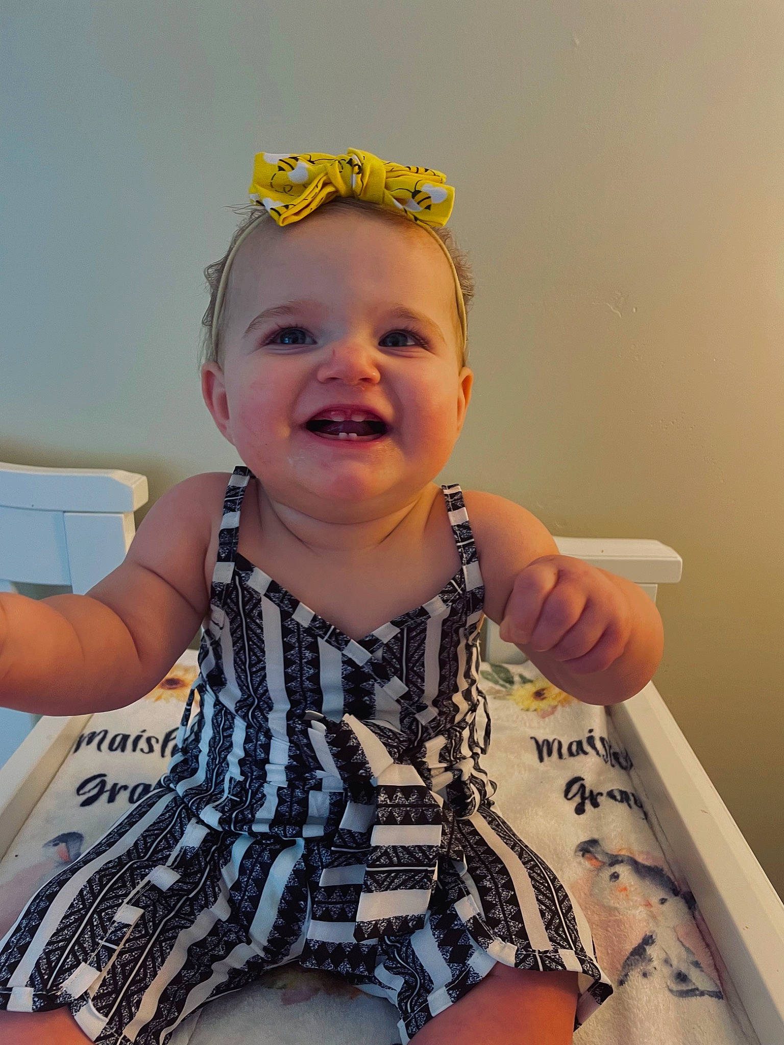 Maisley is registered to the contest to win money with this photo: arm, baby, baby_toddler_clothing, cheek, child, ear, eye, eyebrow, face, finger, gesture, happy, iris, joy, person, pink, purple, skin, sleeve, smile