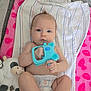 Raelynn joined the competition — help win amazing prizes! baby, infant, toy, teething_toy, blanket, plush_toy, cow, diaper, blue_eyes, cute, child, laying_down, indoor, soft_toy, pink, white, striped_blanket, hand, foot, skin