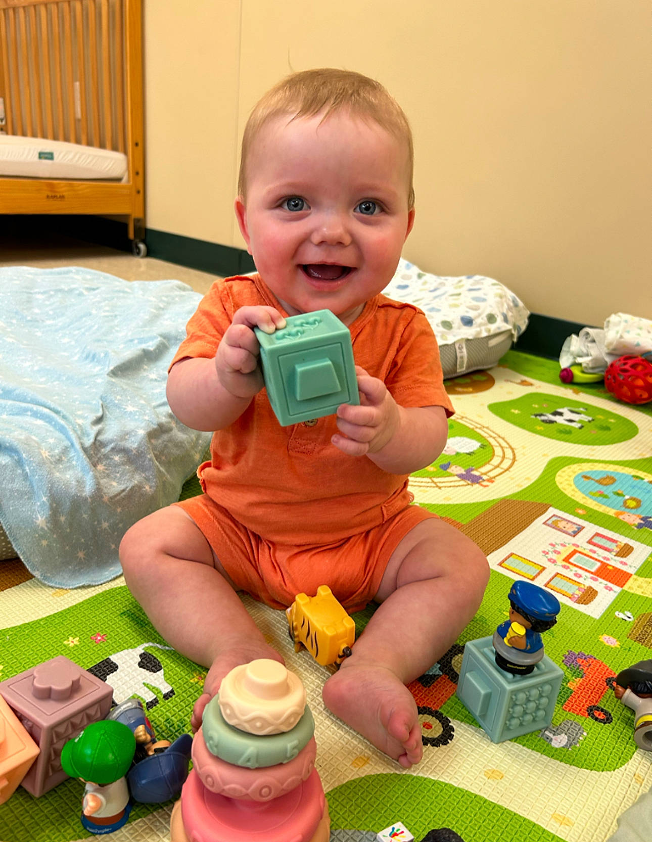 Nathaniel joined the competition — help win amazing prizes! baby, baby_playing_with_toys, baby_products, baby_toddler_clothing, cabinetry, child, drawer, fun, green, joy, person, plastic, plastic_bottle, play, product, room, sitting, smile, thigh, toddler