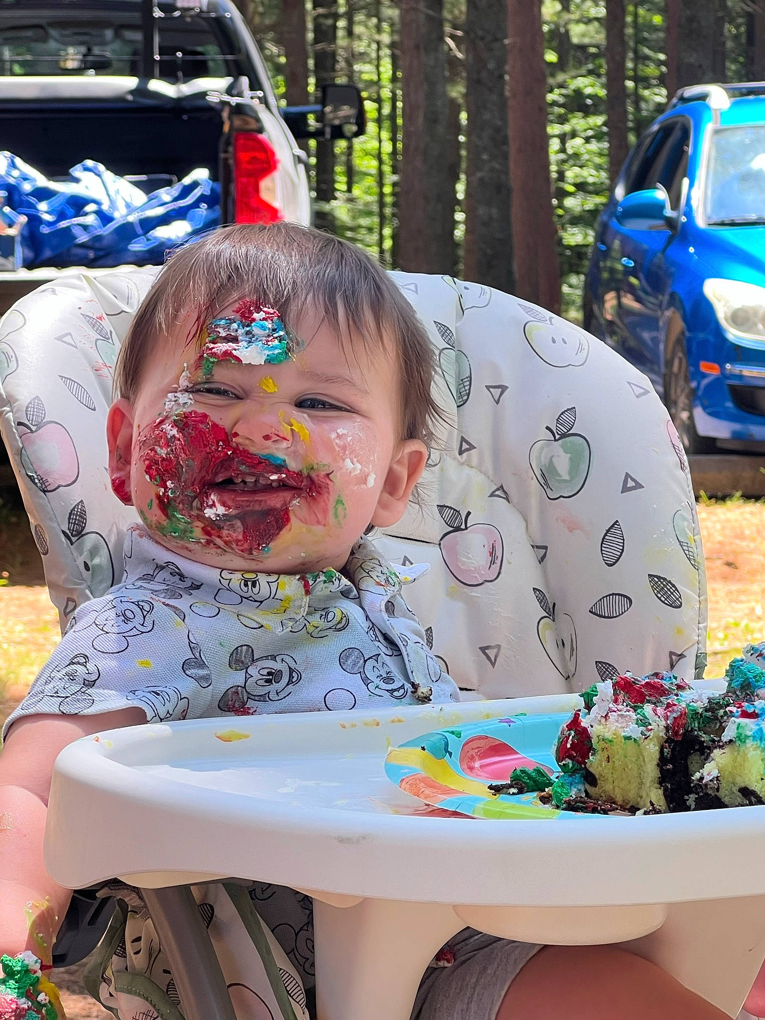 Emmet is registered to the contest to win money with this photo: automotive_lighting, automotive_tire, blue, car, child, event, fun, grass, green, happy, leisure, motor_vehicle, person, pink, recreation, spring, summer, tire, toddler, tree