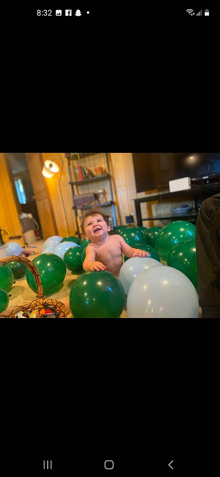 Emmet is registered to the contest to win money with this photo: balloon, electric_blue, entertainment, event, eyewear, flash_photography, fun, games, glass, happy, helmet, inflatable, leisure, magenta, night, party, party_supply, performing_arts, person, recreation