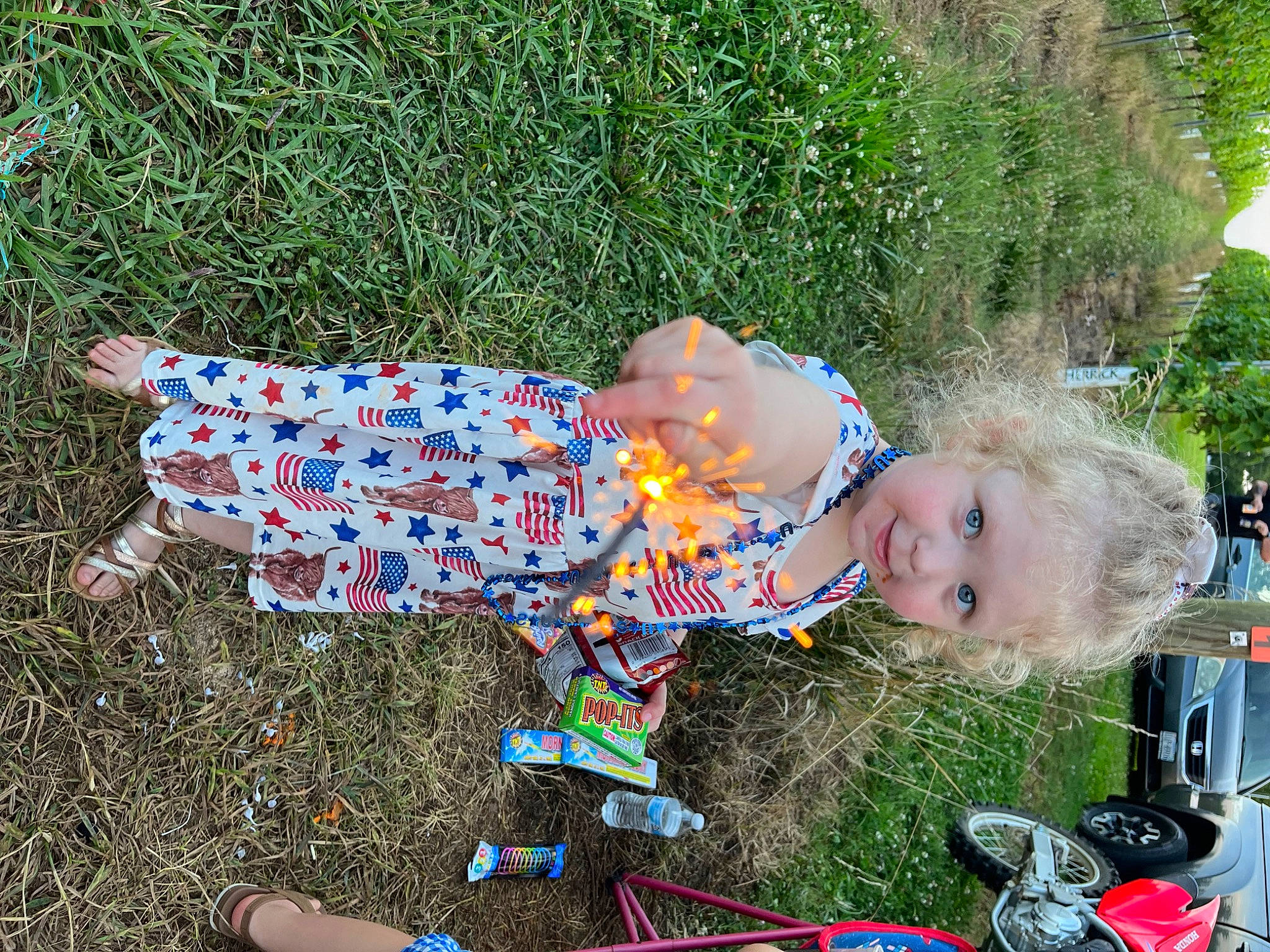 Chloe is registered to the contest to win money with this photo: baby, baby_toddler_clothing, child, electric_blue, fun, grass, happy, leisure, pattern, people_in_nature, person, plant, play, recreation, smile, toddler, tree, window, yard