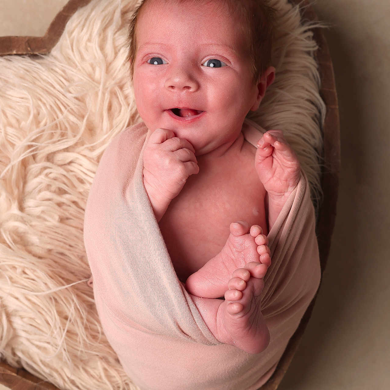 Juniper is registered to the contest to win money with this photo: baby, blanket, child, cozy, cream_fabric, cute, face, feet, fluffy, hands, heart_shaped_bowl, infant, nestled, newborn, portrait, skin, smiling, soft_lighting, studio_photo, wrapped