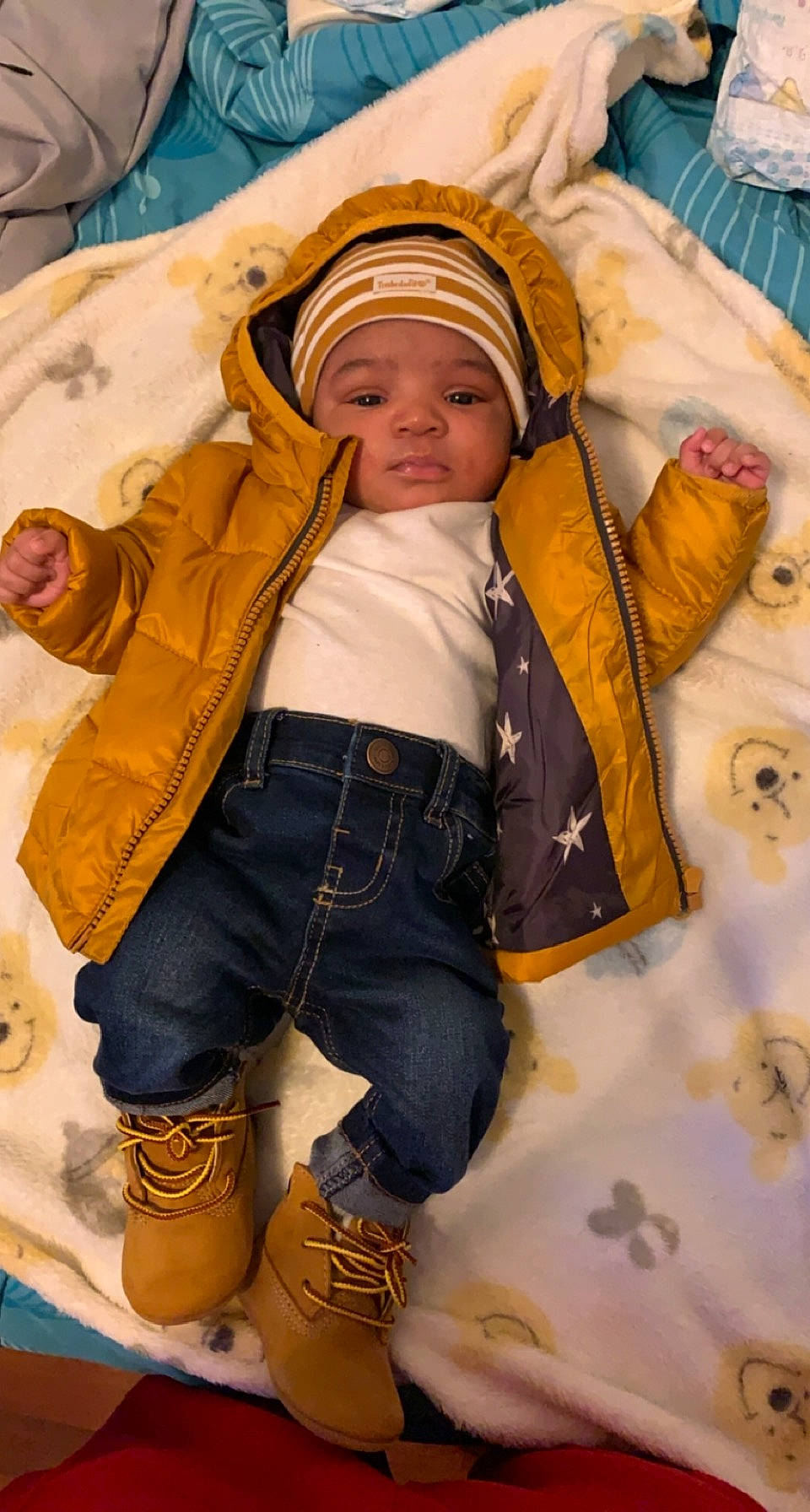 Aamir joined the competition — help win amazing prizes! baby, baby_products, baby_toddler_clothing, beige, cheek, child, child_model, costume_accessory, denim, headwear, hood, jeans, nose, overall, person, pocket, toddler